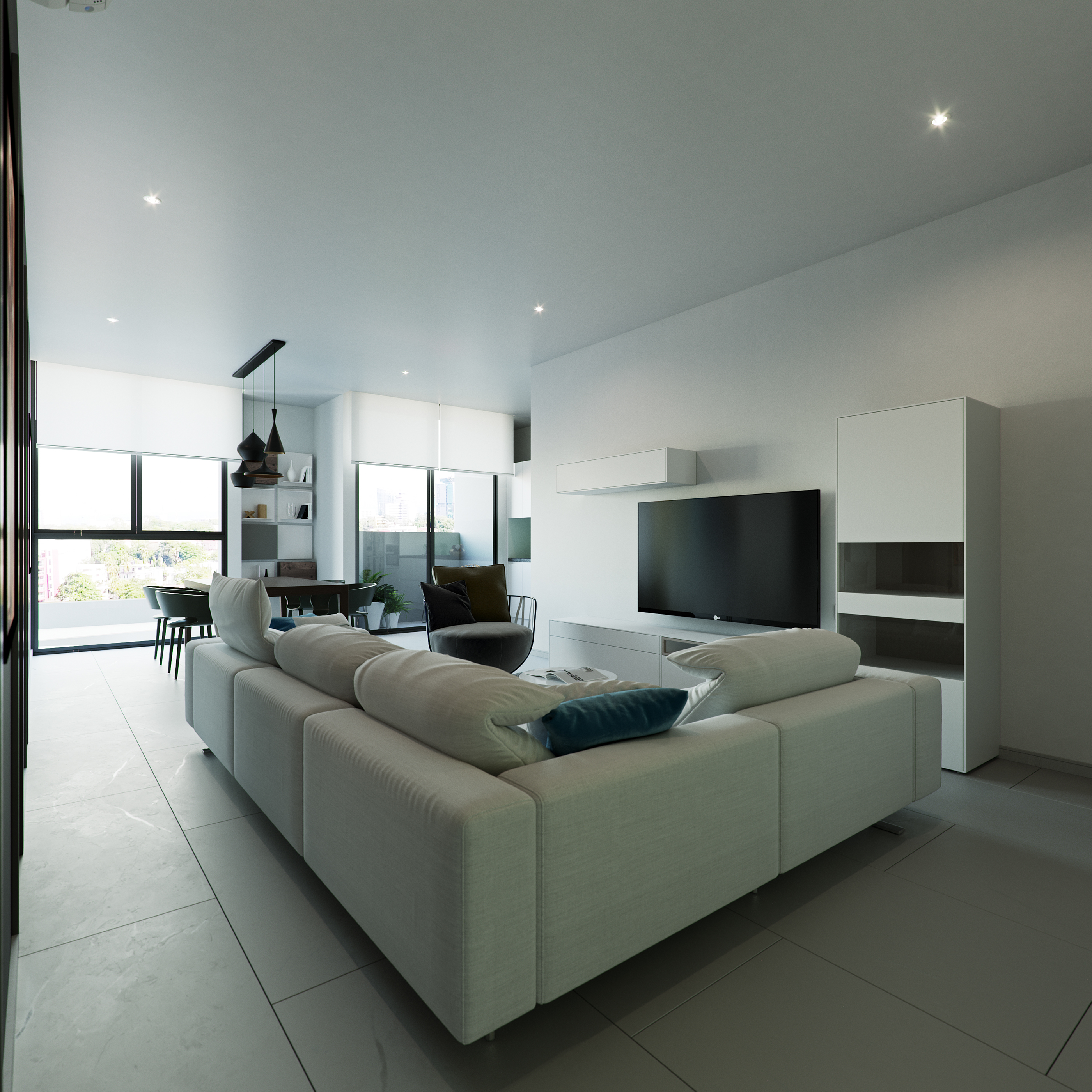 1957 Apartments and Retail second living room: pale grey modular sofa with a teal cushion facing a wall-mounted TV on a white media unit, dining table and cone pendants beyond, dark armchair in the corner.