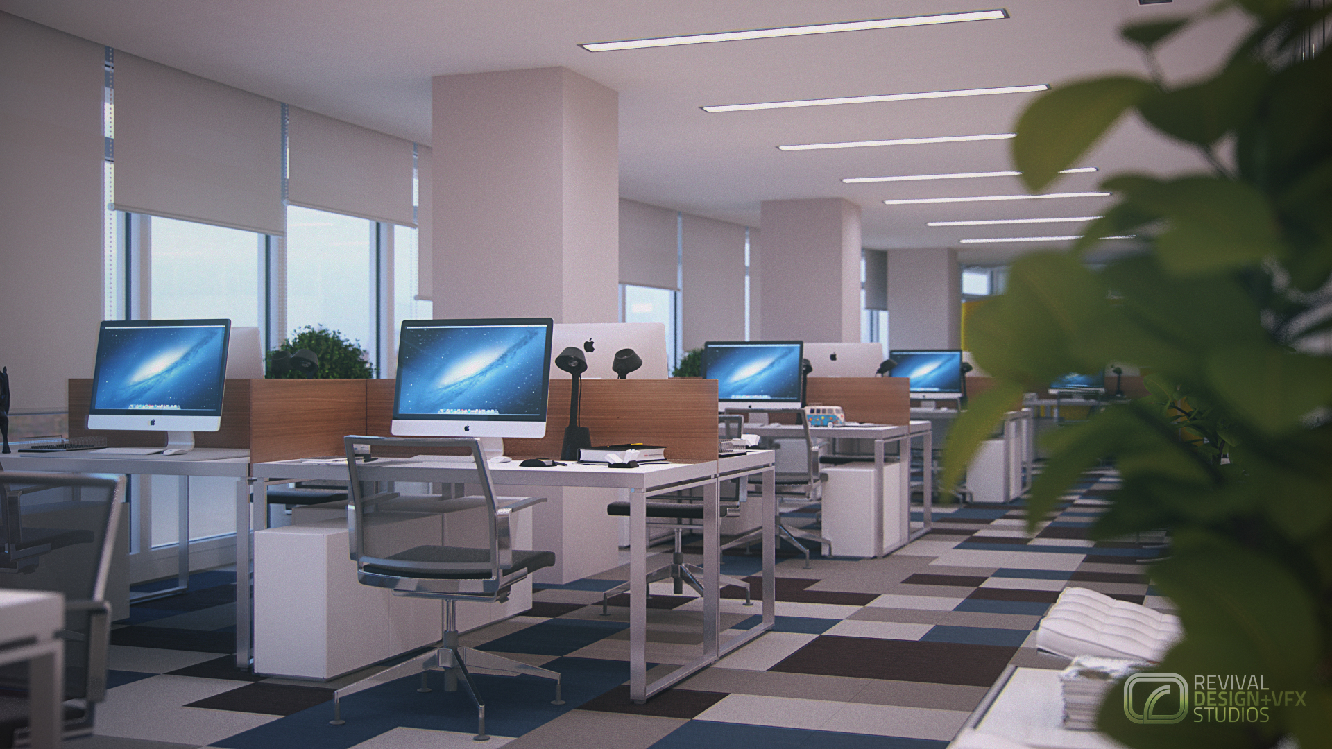 Advantage Place office looking the other way along the same row: monitors on a blue galaxy wallpaper behind wood-grain screens, grey mesh chairs on chrome frames, white pedestal cabinets and blurred plant leaves at right.