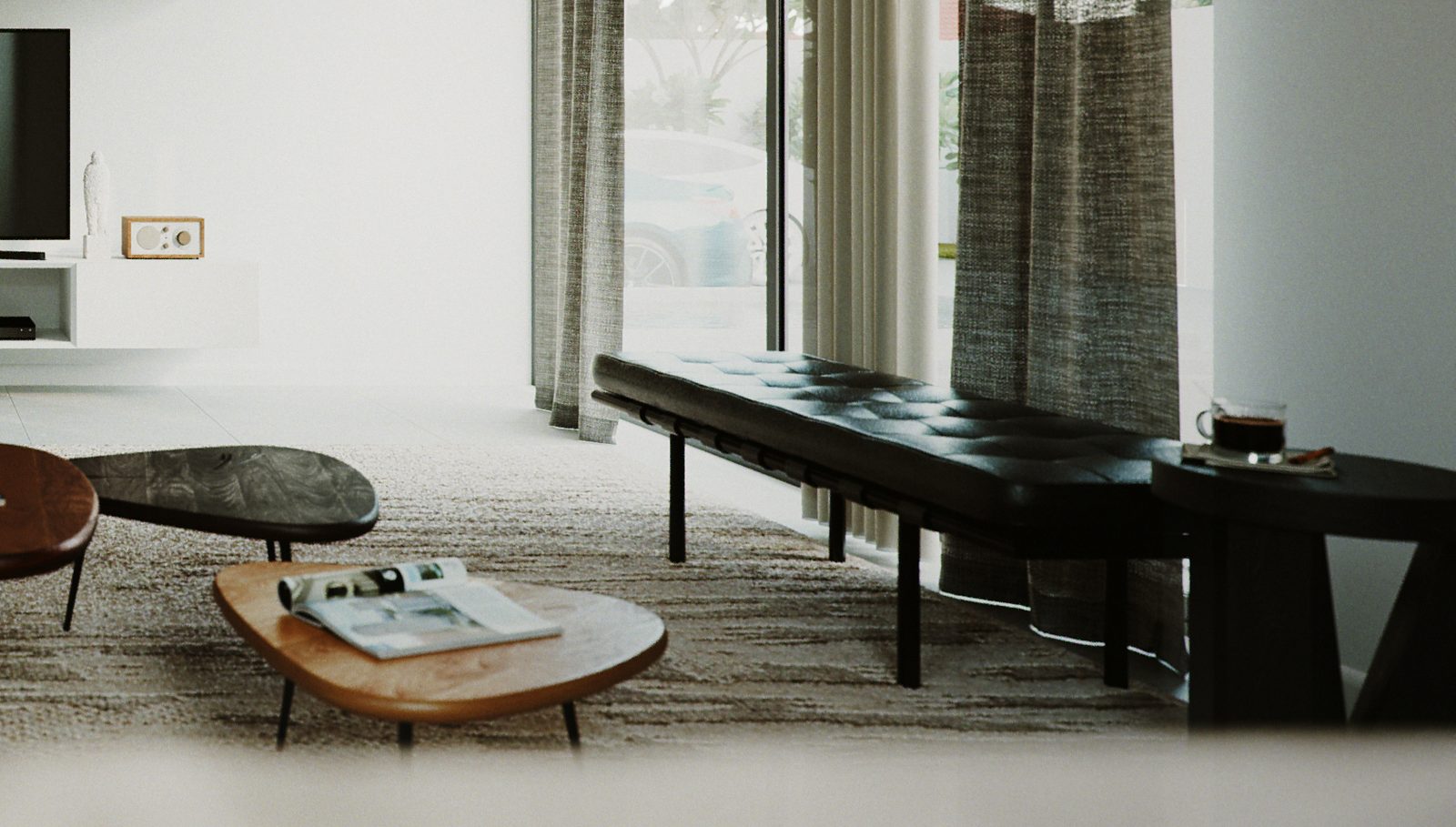 Crop of the same view, concentrating on the bench, the nested coffee tables and the sheer curtains.