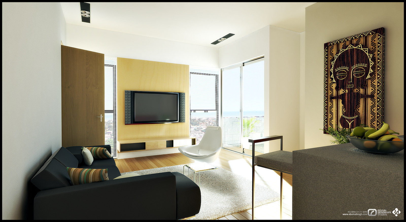 Visualization of a compact living room: a dark charcoal sofa with striped cushions faces a flat screen set into a mustard-yellow panel, a white molded chair sits by floor-to-ceiling sliding glass doors that open onto a balcony with the sea on the horizon, and a carved African mask panel hangs as art above a grey console. A wood door closes the left wall and the studio&rsquo;s watermark sits at the bottom right.