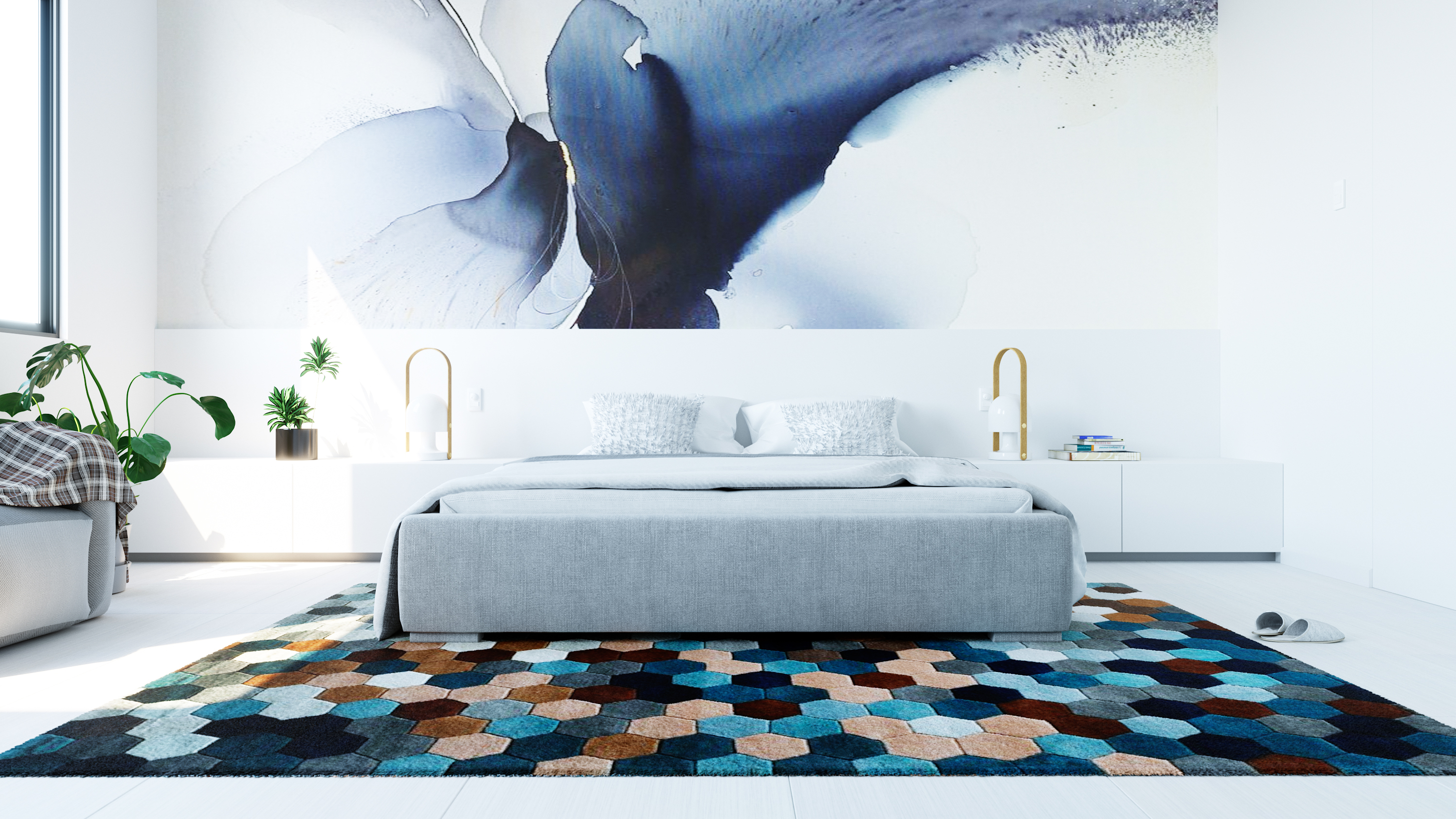 The bedroom: a grey upholstered bed centred under a large blue and white ink-wash canvas, brass reading lamps on white floating nightstands, a hexagonal patchwork rug in teal, rust and navy on a pale floor, and potted plants at the left