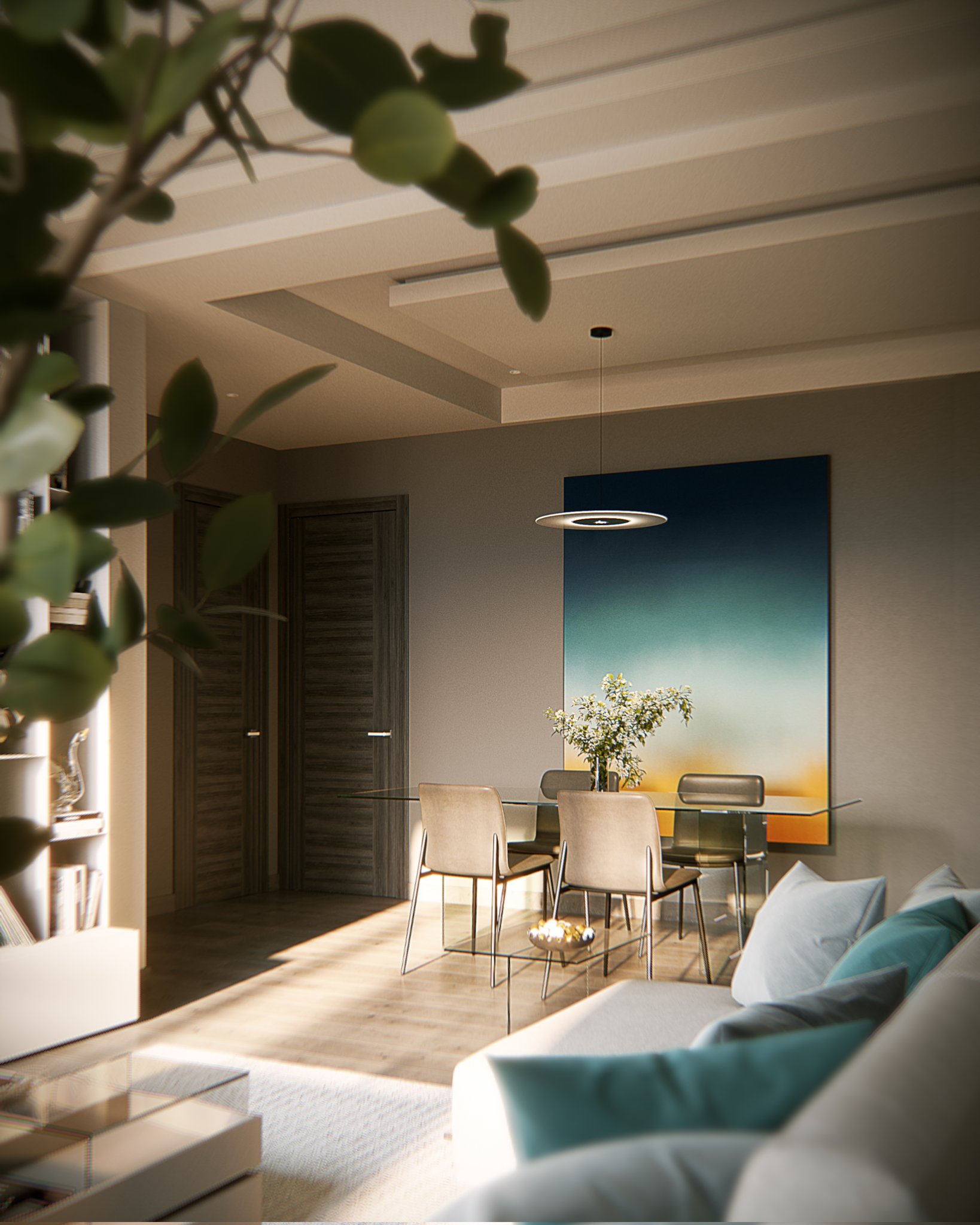 Avalon dining corner in portrait from behind the sofa: glass table with mixed cream and grey chairs before the blue-to-orange gradient wall panel, disc pendant above, blossom in a vase and a glass side table holding a bowl of gold objects.