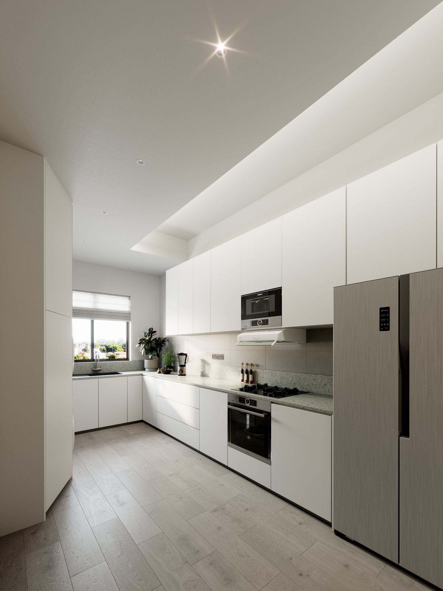 Avalon kitchen from the opposite end along the run: a stainless side-by-side fridge with a black control panel at right, white cabinets, microwave and angled hood, the sink and roman blind far left under a starburst ceiling downlight.