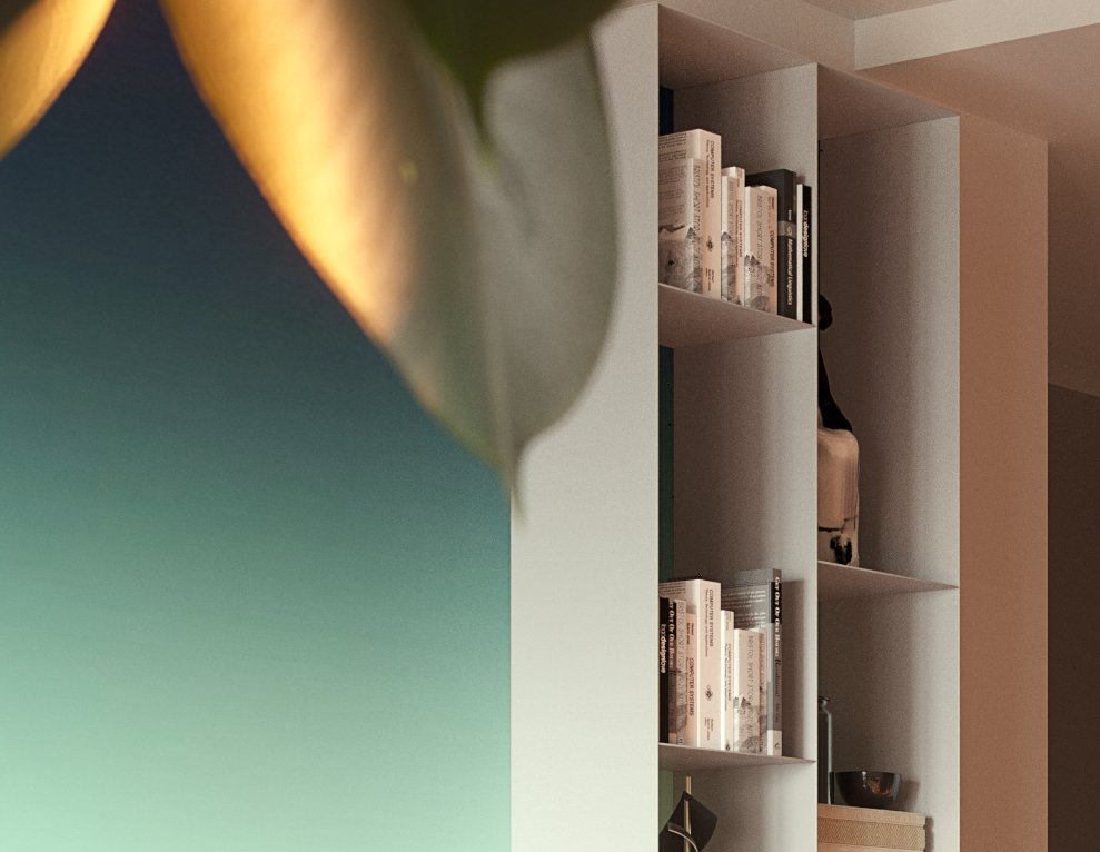 Avalon close on the tall open shelving: recessed taupe niches with rows of books, a dark sculpture and a small metal bowl, the teal gradient wall at left and a sunlit leaf blur across the top corner.