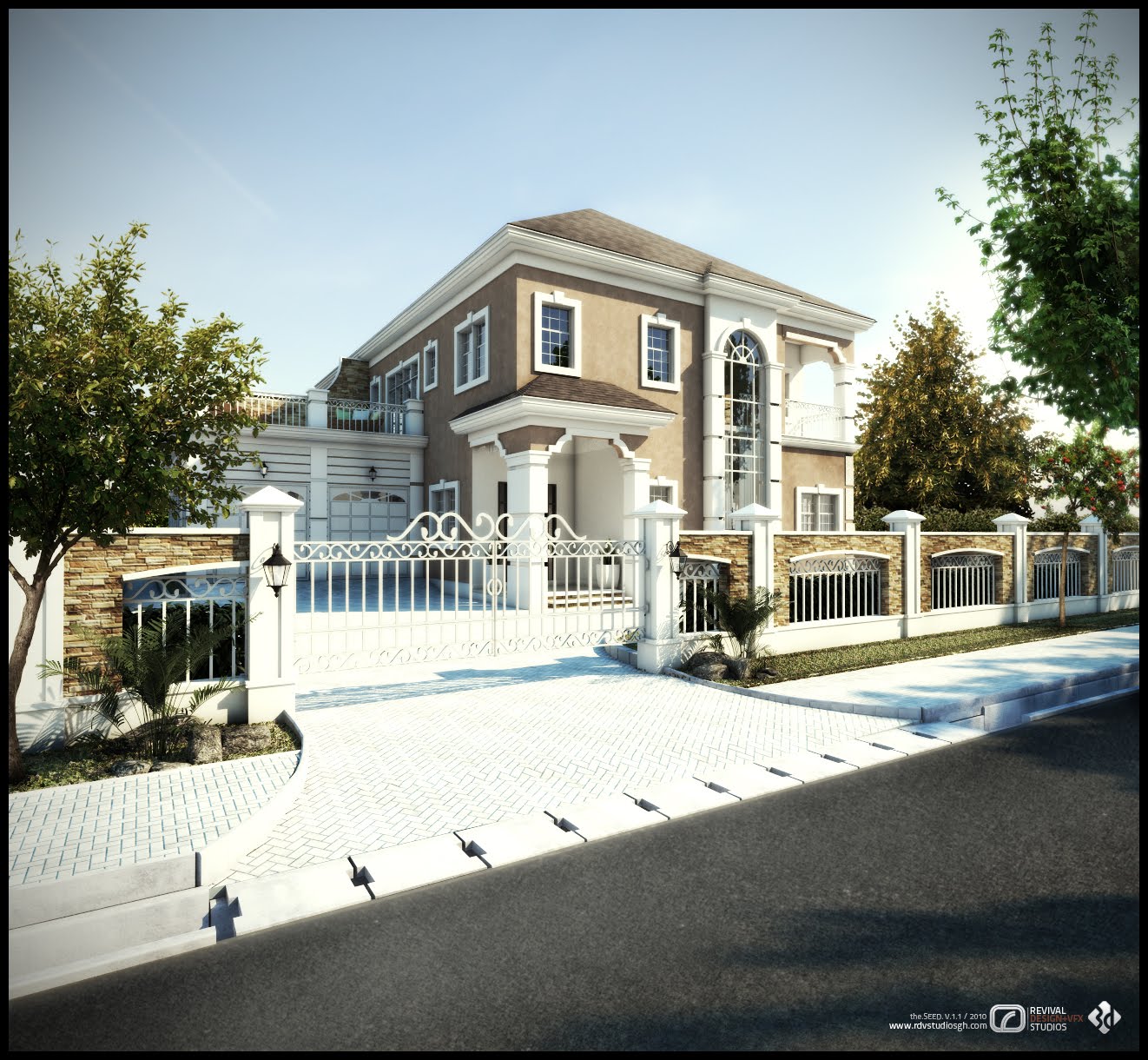 The street view of that taupe and stone house: white ornamental gates between stone-clad piers open onto a broad paved driveway sweeping up from the kerb, with a gabled porch canopy on white columns at the centre and a tall arched stair window to the right. A lower wing at the left carries two panelled garage doors beneath a balustraded terrace, the boundary wall continues as stone facing with metal railings, and young trees and a paved footpath run along the road in the foreground.