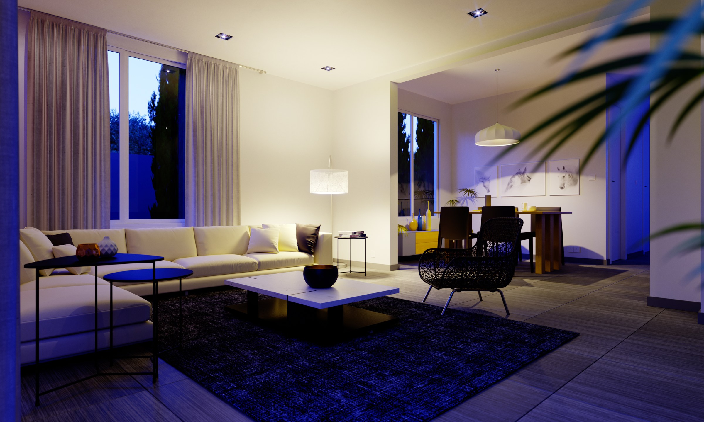 Evening render of the lounge: warm ceiling downlights and table lamps against deep blue dusk in the windows, cream sofa lit from within, black chairs and a coffee table on the dark rug, a palm frond crossing the right foreground.