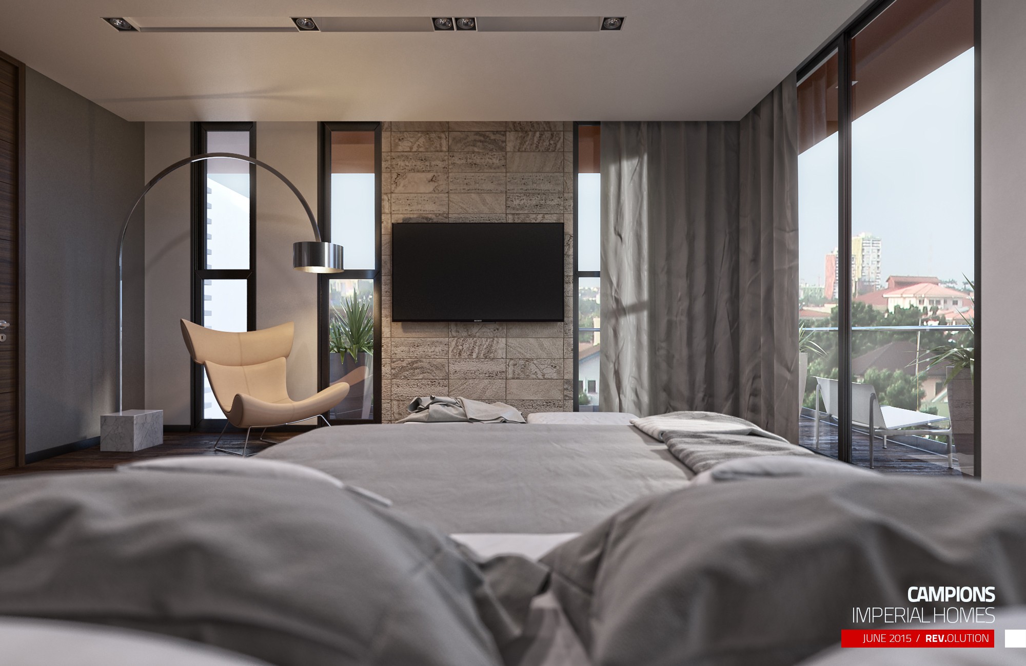 A bedroom: the bed facing a stone feature wall with a wall-mounted television, an arched floor lamp and a city view through the window