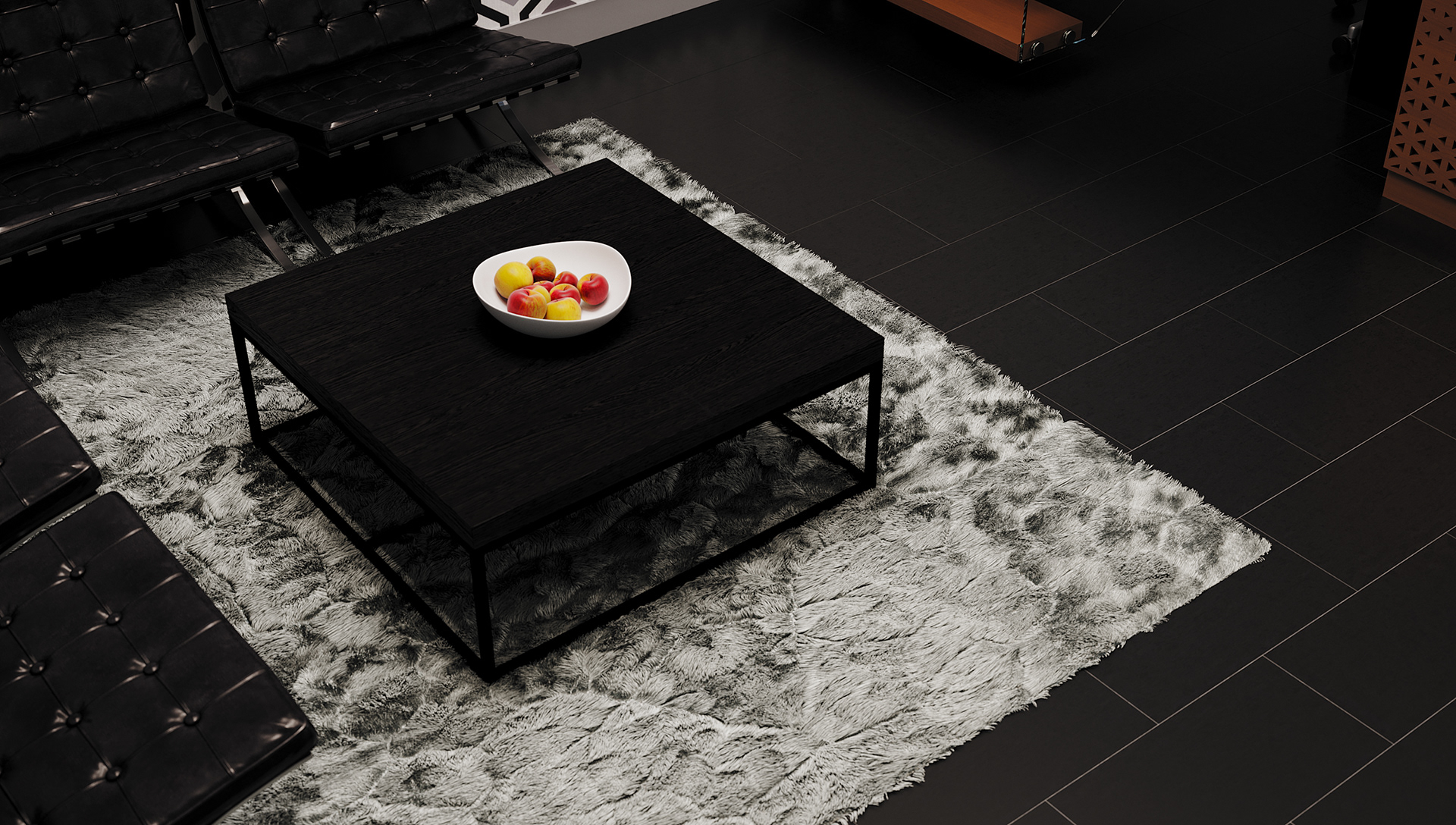 West Cantonments Residence lounge from above onto the table: a slatted dark oak top on a black metal frame with a white oval bowl of apples, grey long-pile rug, black tile floor and the edges of tufted leather seating.