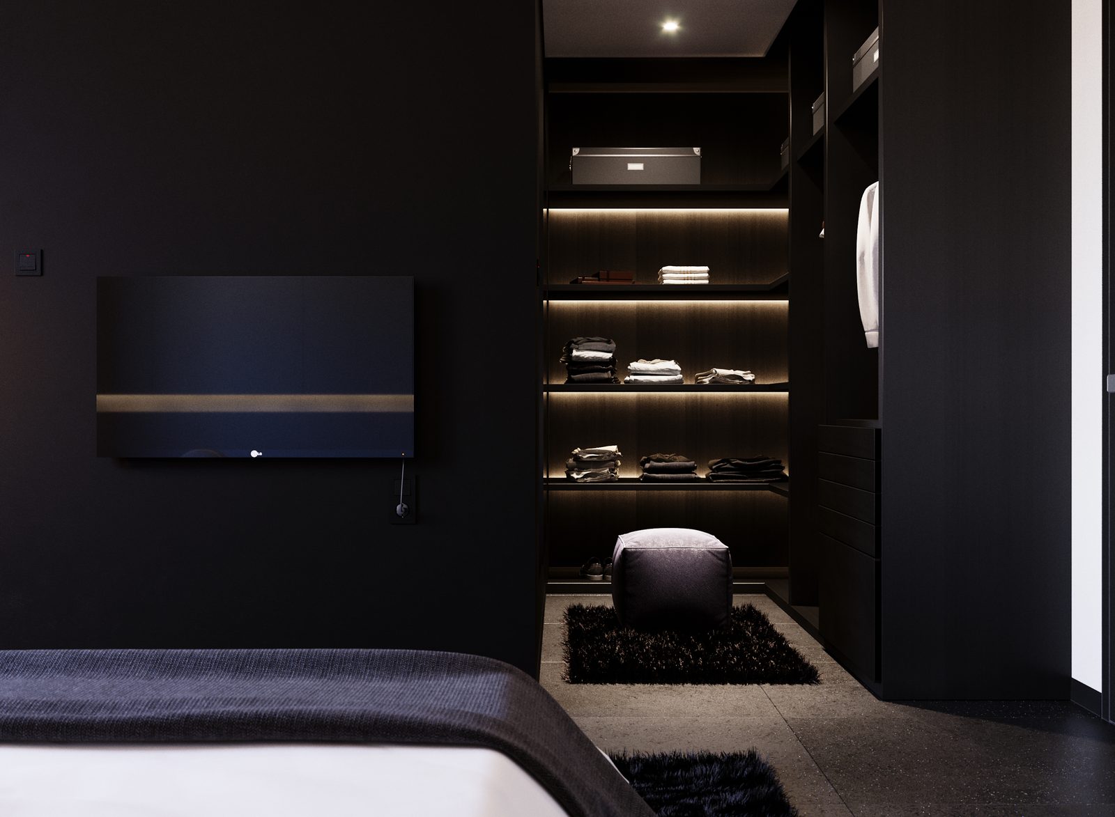 Tower Cascades - Dressing media wall in dark joinery: a wall-mounted screen above a low bench, with a lit open wardrobe of shelves and hanging rails to the right.