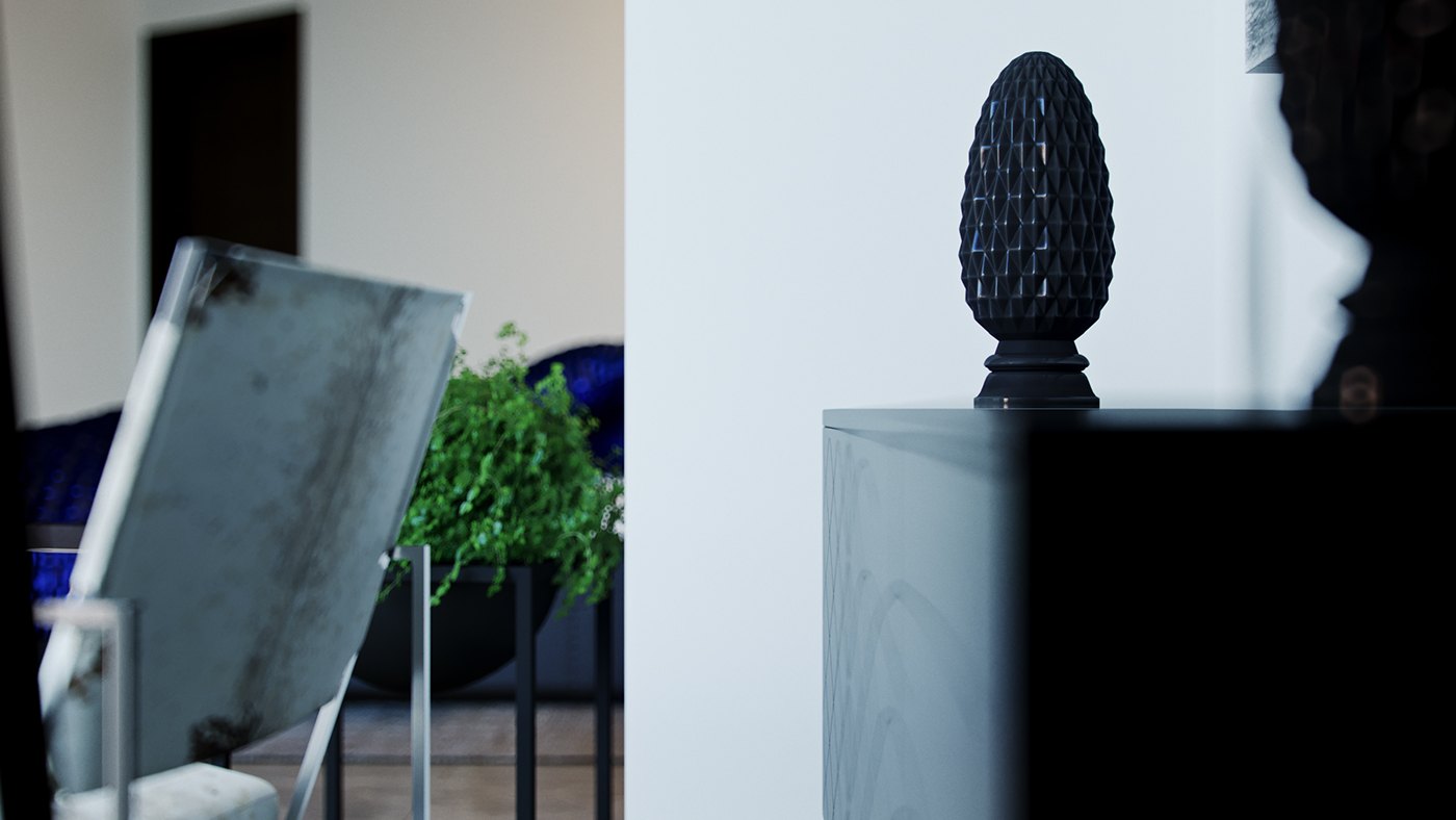 A rendered detail shot of the guest room&rsquo;s decor, a pale framed mirror leaning near a black sculptural finial on a dark pedestal. Soft daylight and a green plant sit behind, with navy bedding blurred at the left, emphasising the room&rsquo;s moody accessories.