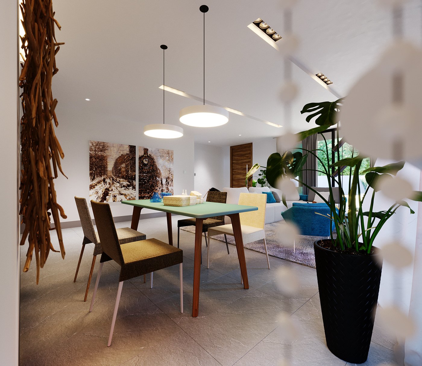 Render of the dining area seen through a foreground of blurred white branches: green-topped table, tan and black side chairs, black planters with tall greenery, pale carpet and the reed panel and pendant discs behind.