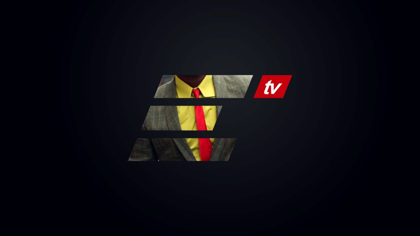 ELO TV ident mid-animation: a single slanted E letterform masked over a man's grey tweed jacket, yellow shirt and red knitted tie, with a small red tv parallelogram at right.