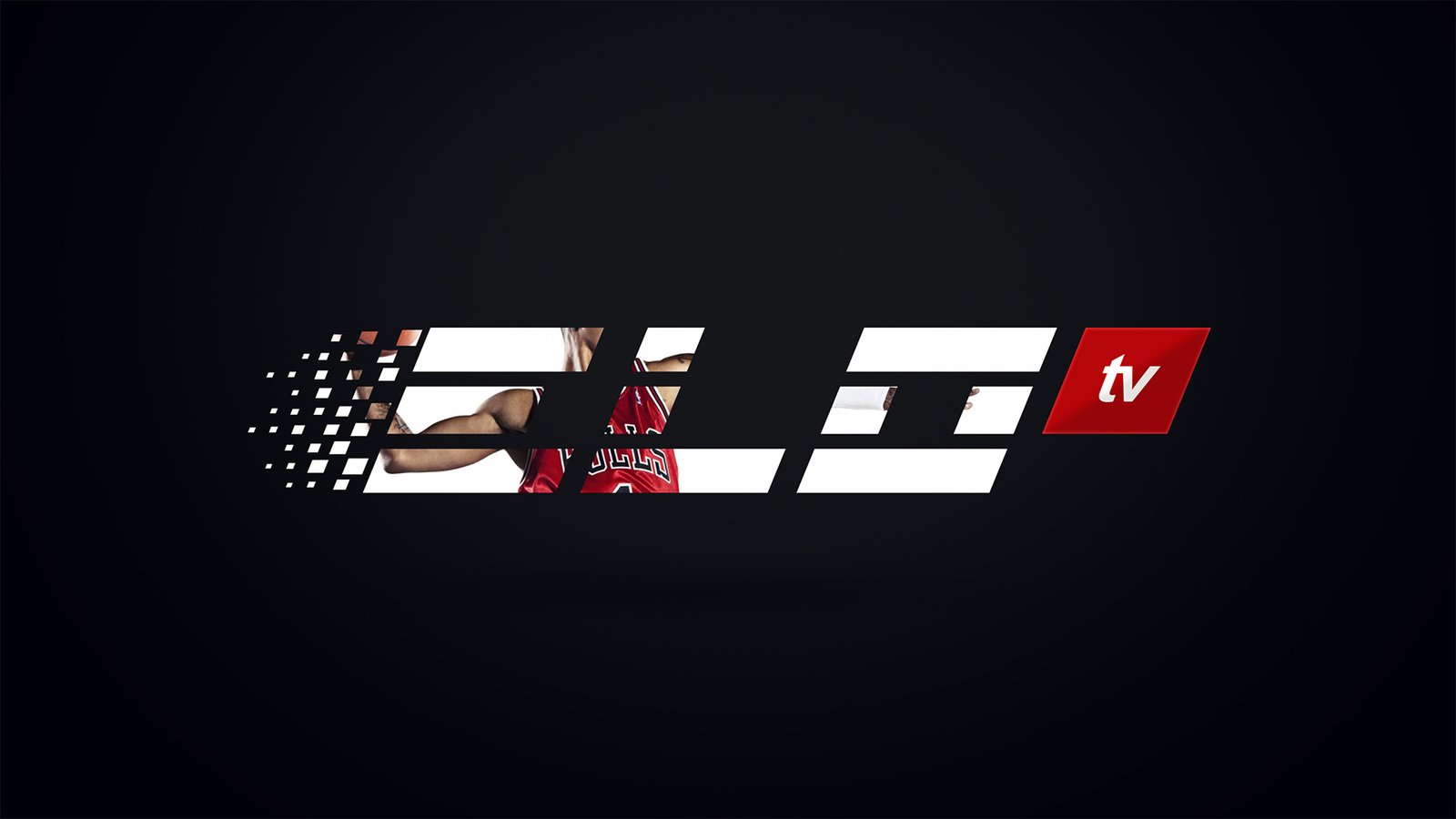ELO TV ident frame: a basketball player in a red Bulls jersey caught mid-motion inside the white letterforms, the pixel trail dispersing at left and a red tv block at right.