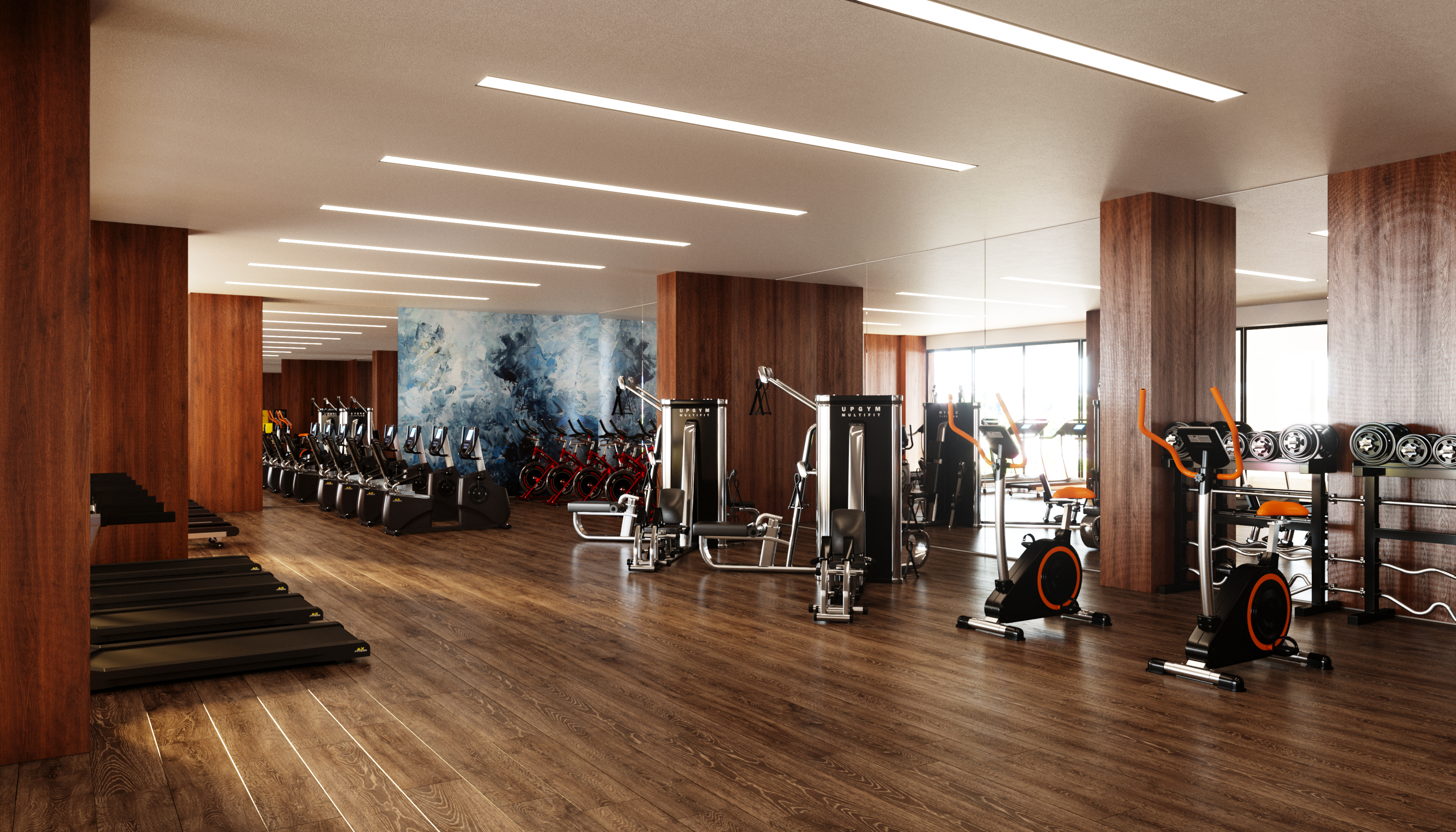 Empire Tower fitness floor: treadmills lined along polished oak columns, a blue abstract mural on the far wall, and spinning bikes with a cable machine under a ceiling of long linear lights.