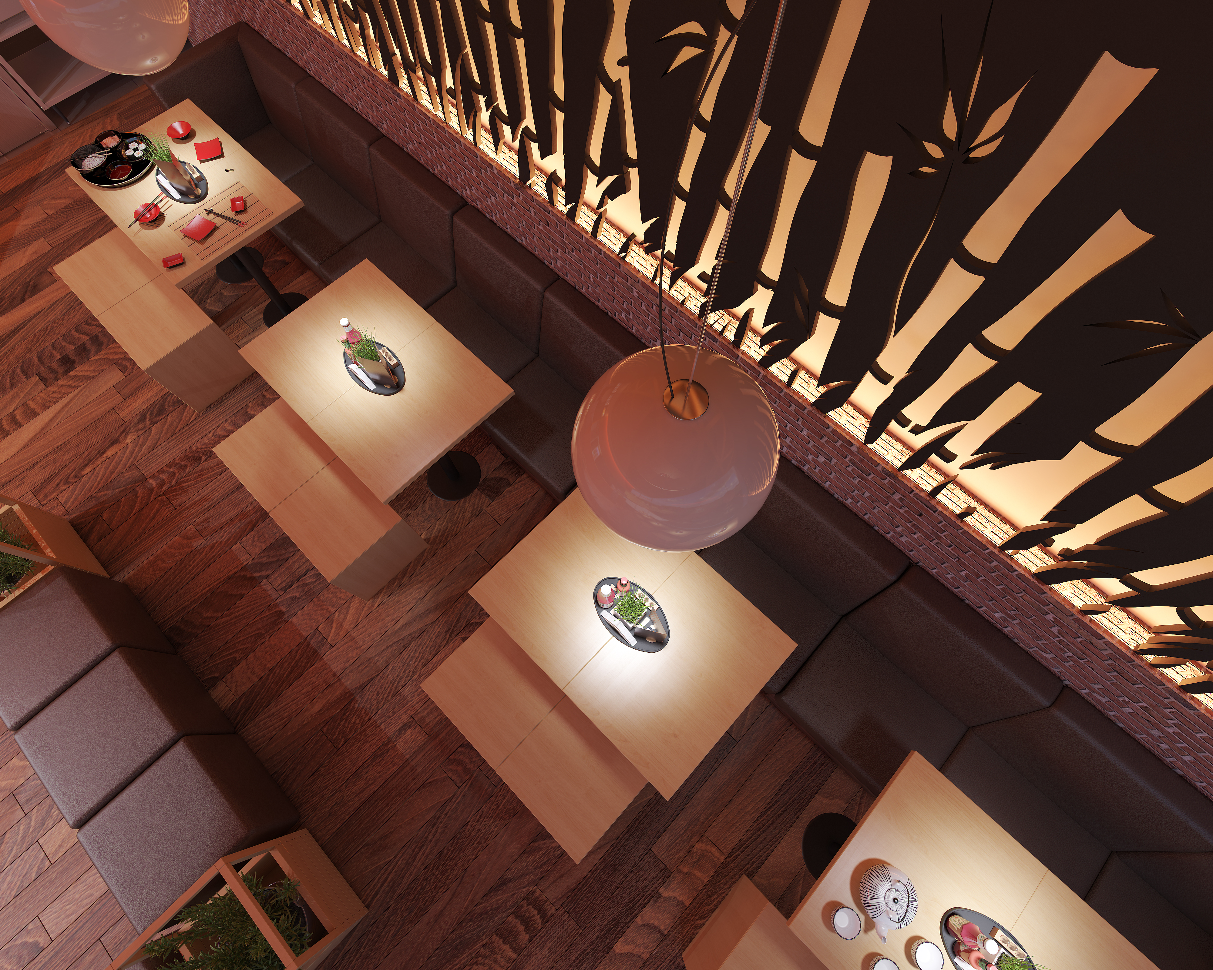 Enda WHM seating plan from above: oak tables laid with caddies and a sushi tray, leather banquettes running to the brick and bamboo screen, and a pink globe pendant dropping into frame over parquet flooring.