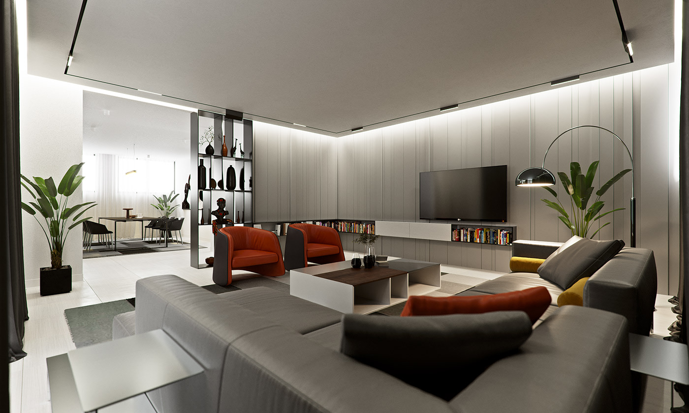 Funko Ridge Residence living room wide: grey sectional with rust and yellow cushions facing orange tub chairs and a low coffee table, TV and lit book ledge on the fluted wall, dining area beyond the shelving divider.
