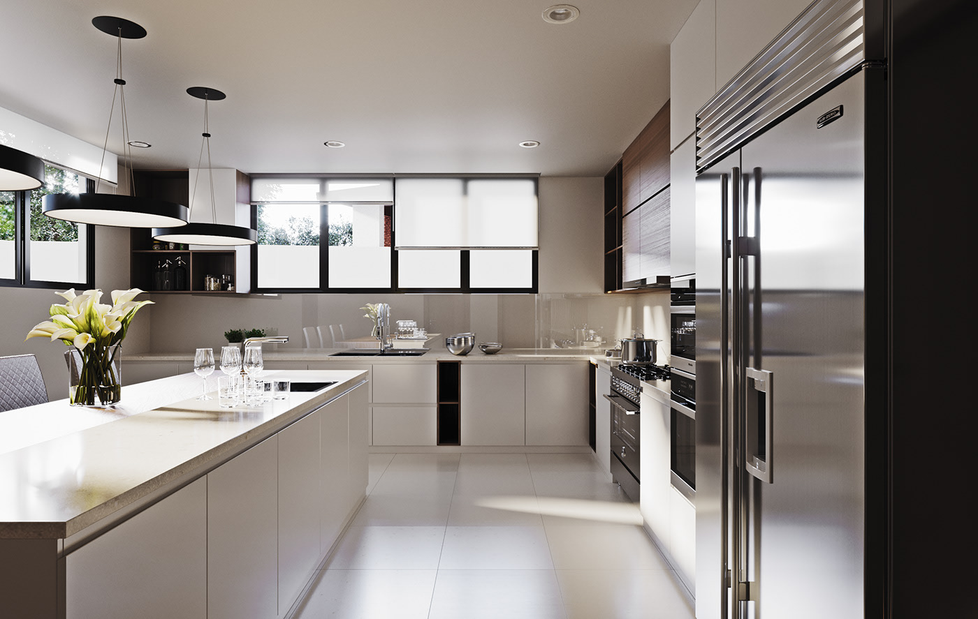 Funko Ridge Residence kitchen from the appliance wall: stainless fridge and stacked ovens at right, pale island with lilies and glassware at left, black ring pendants under a band of windows.