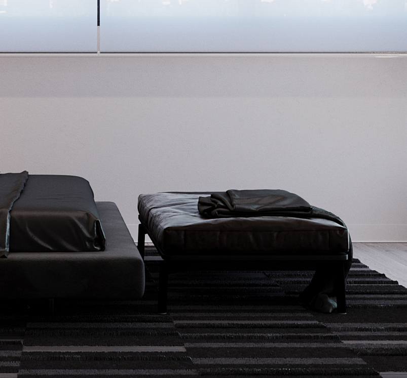 Funko Ridge Residence bedroom floor detail: black leather ottoman with a folded throw at the foot of the low bed, striped charcoal rug under a pale wall and frosted window band.