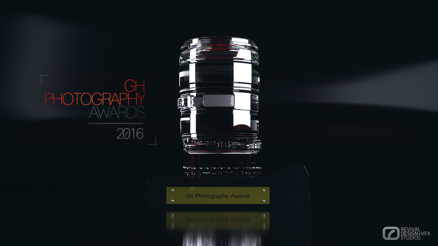 The same award in a neutral pass, the barrel reading white and chrome against a grey band, the nameplate and its reflection the only warm notes in the frame