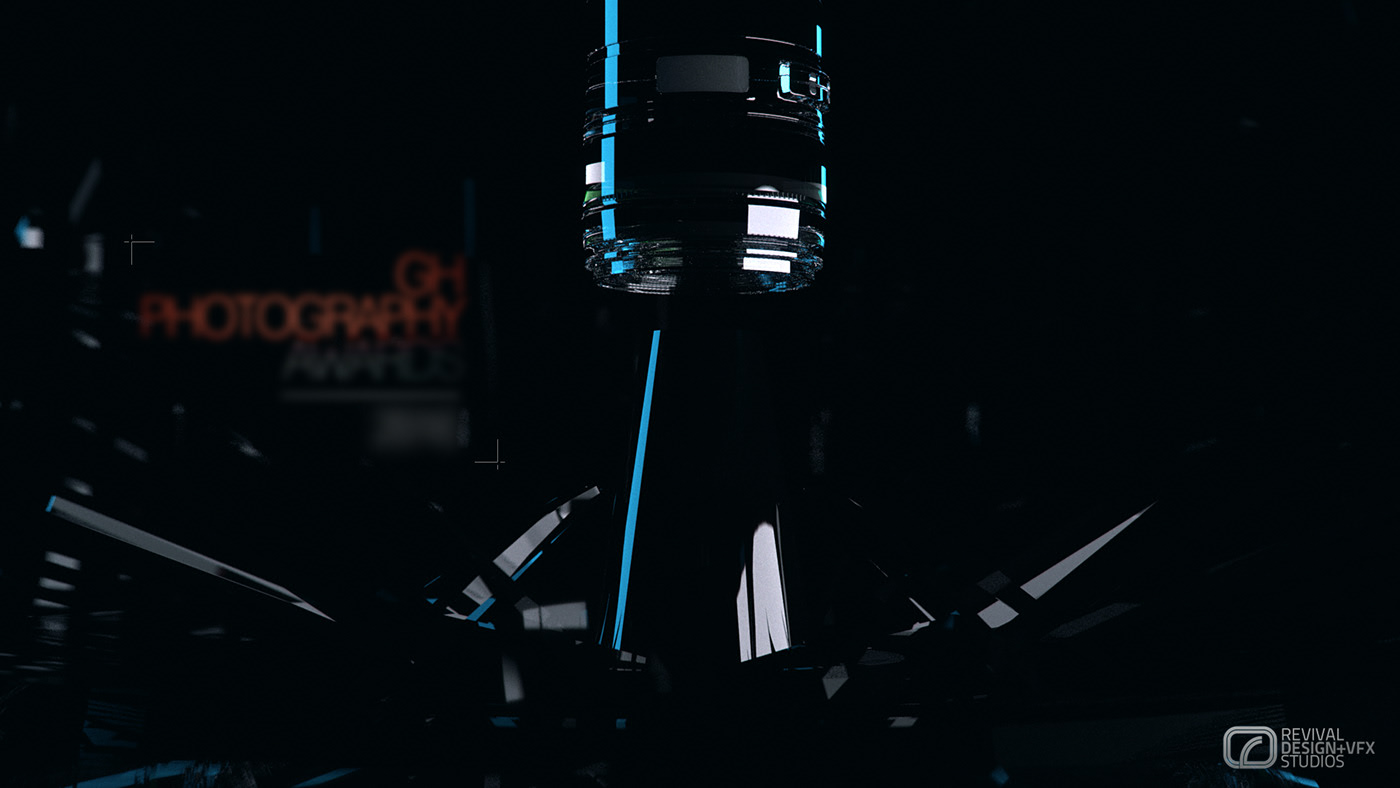 The cyan column and shard base again from further back, the trophy left largely in silhouette and the lettering at the left thrown out of focus