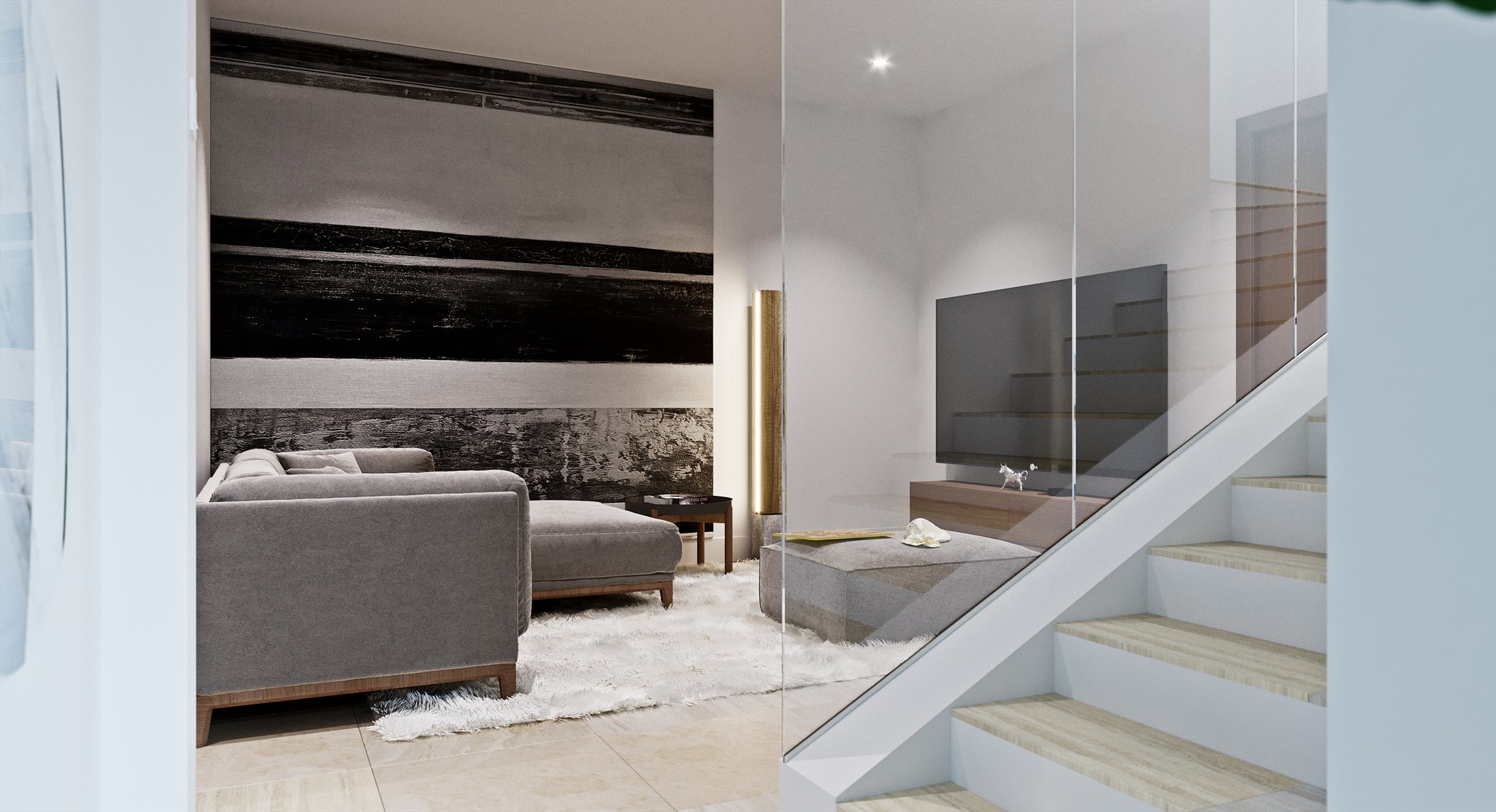 The Hamlet lounge seen past a stair: pale oak treads behind a glass balustrade, a grey L-shaped sofa and ottoman on a white shag rug, a black-and-sawn-wood slatted feature wall, a wall-mounted TV over a floating oak console, and a brass column floor lamp.