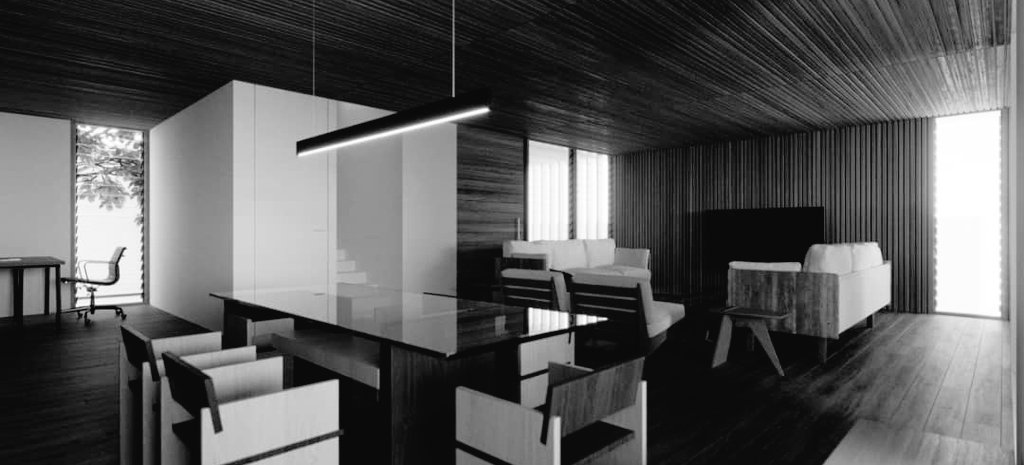 Kuma Residence in monochrome from the other side: a dark glass-topped dining table with pale chairs under a linear pendant, a white stair volume to the left and the lounge beyond beneath the slatted timber ceiling
