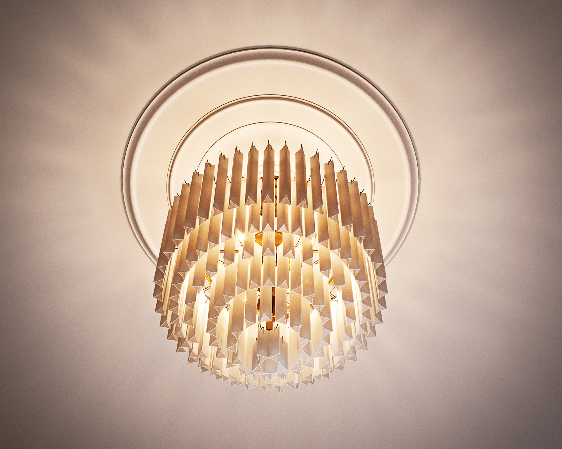 Link Drive Rd. chandelier from below: tiers of white candle-shaped slats with pointed ends hung in a dome from a brass frame, warm light spilling through the gaps, set into a circular stepped ceiling rose.