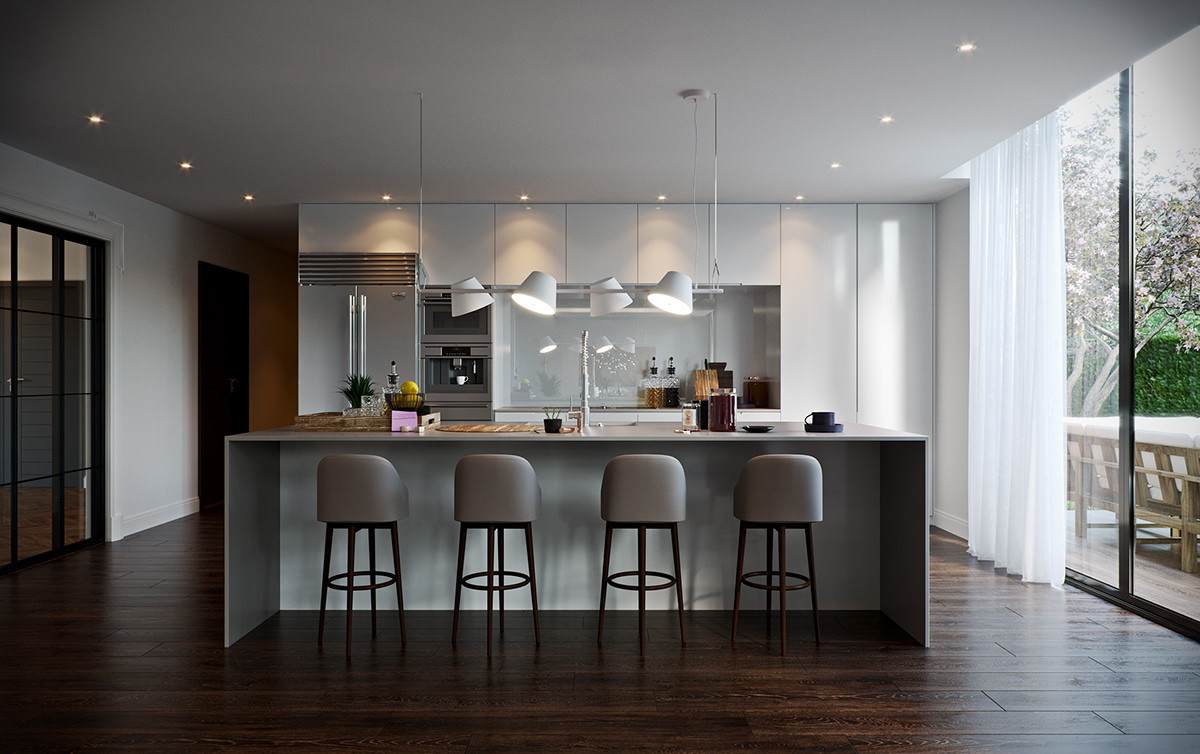 Link Drive Rd. kitchen: a long pale island with four grey upholstered stools under a suspended fitting of four white cone spots, handleless grey cabinets and a mirrored splashback with built-in ovens behind, sheer-curtained glazing to the deck at right on a dark plank floor.
