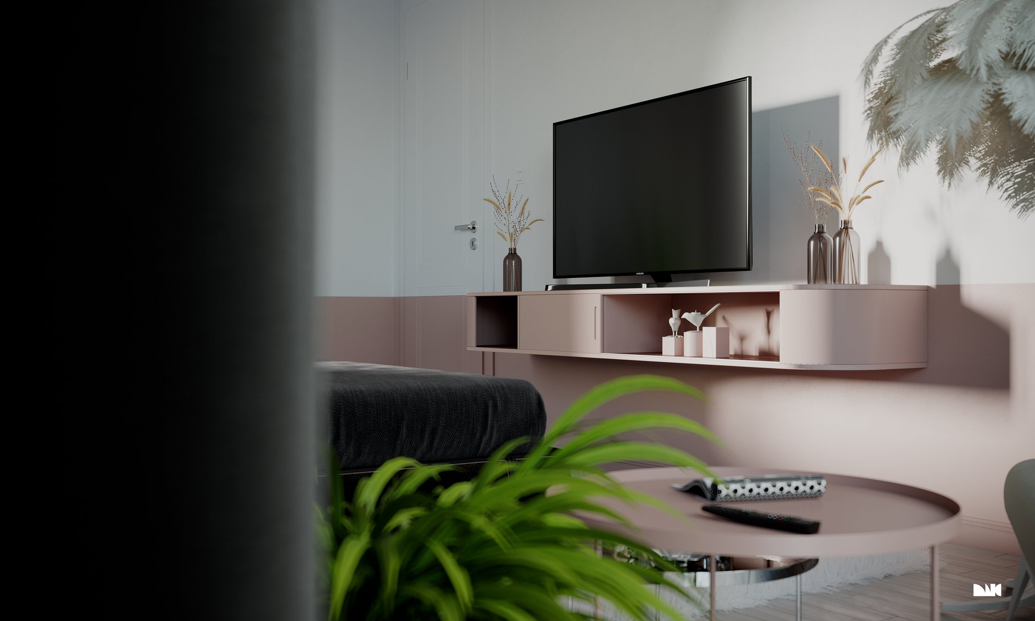 The same room seen past a dark foreground column, the blush unit and screen beyond a round coffee table.