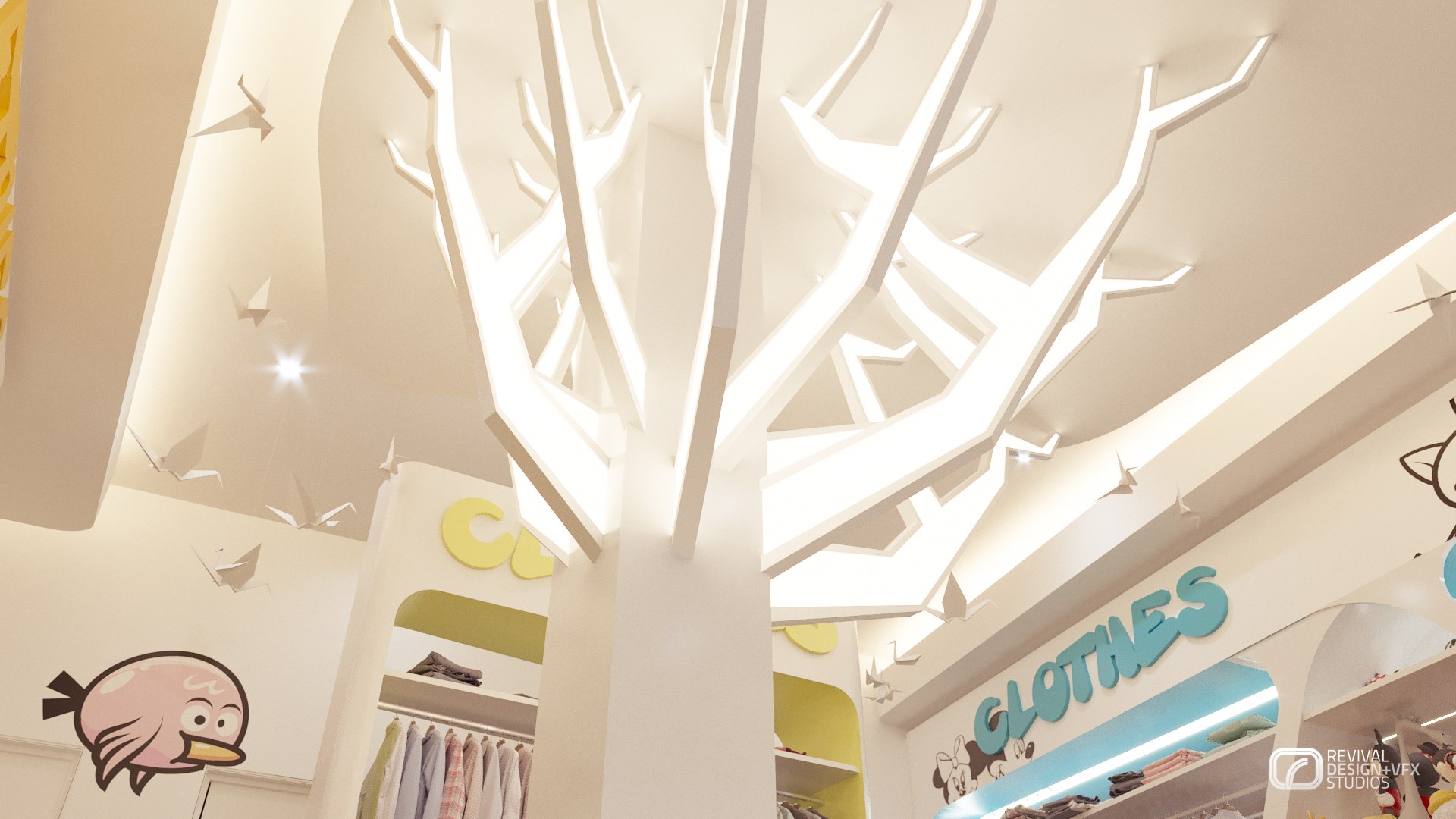 Upward view of an illuminated white tree sculpture spreading against a cloud-shaped cove ceiling, with a teal CLOTHES sign, yellow shelving and a cartoon bird face graphic on the wall below