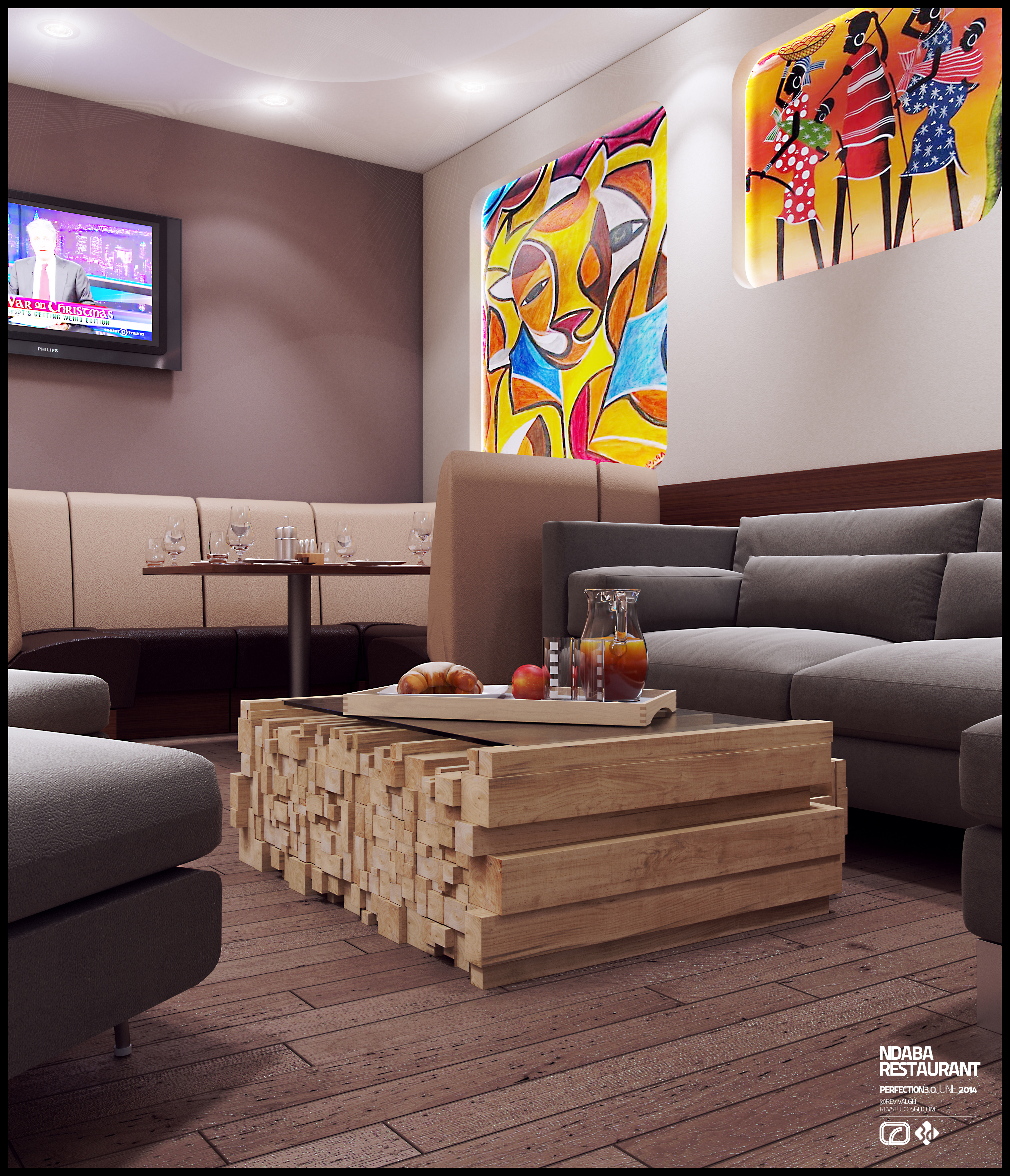 The lounge corner: a low table built from stacked pale timber battens under a glass top in front of a grey modular sofa, with two backlit paintings glowing on the wall behind