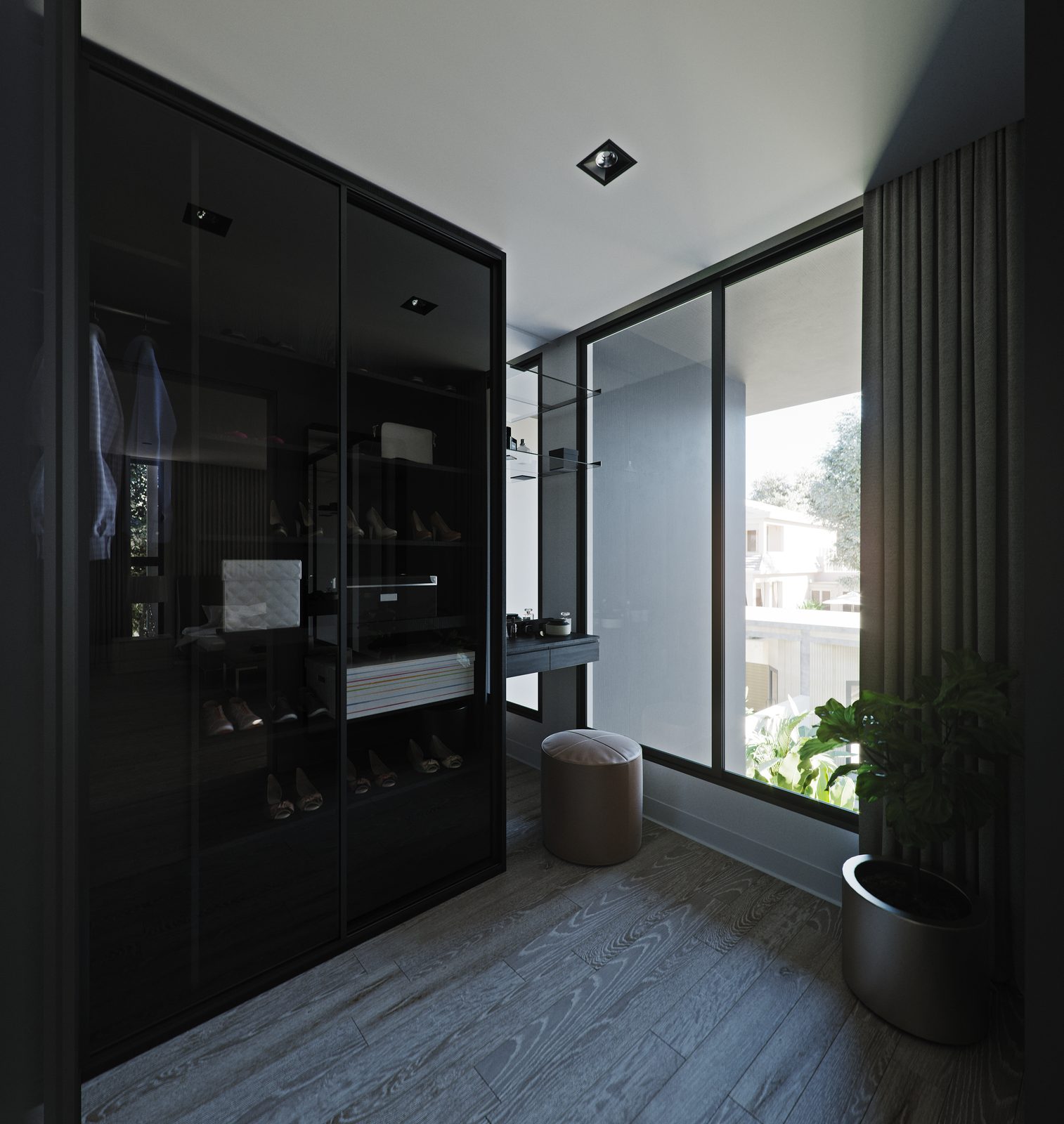 Black glass wardrobe unit at the corner of the dressing room with its interiors lit, a stool and the window wall beyond.
