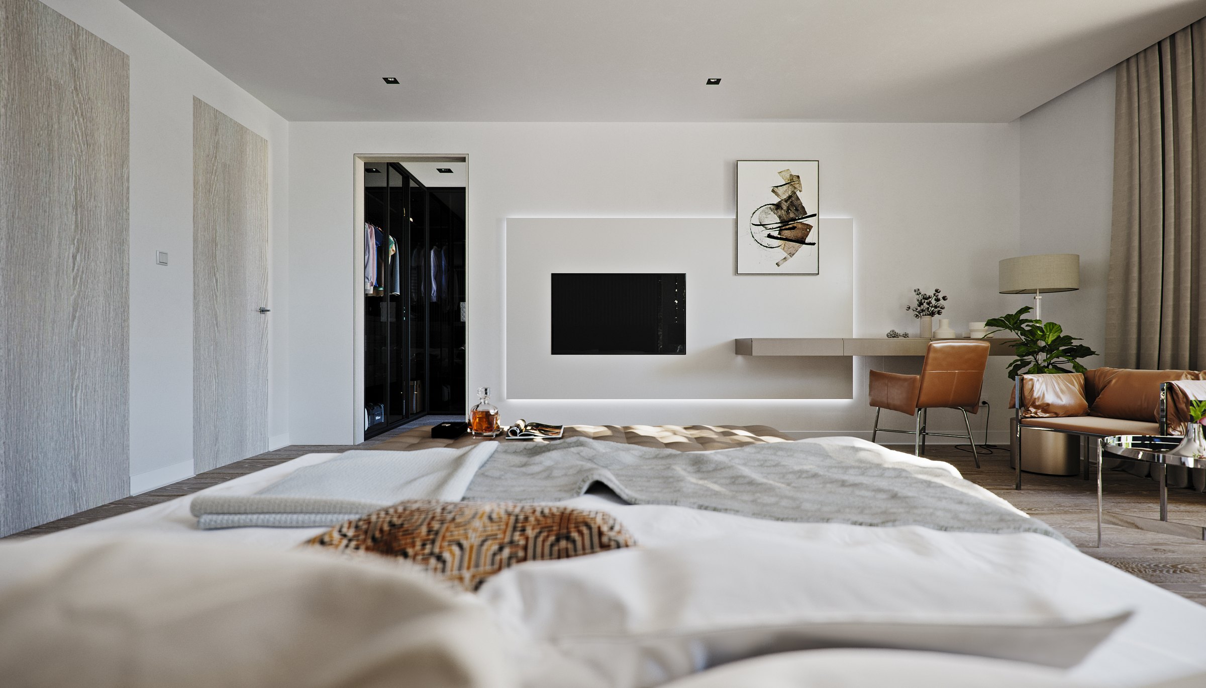 Nyla Court master bedroom, the backlit media wall and floating desk seen over the bed, with the glazed walk-in wardrobe and the lounge bay beyond.