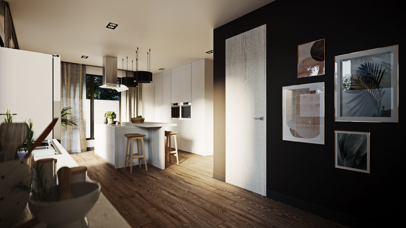 Kitchen open to the dining area, with a black feature wall hung with framed prints.