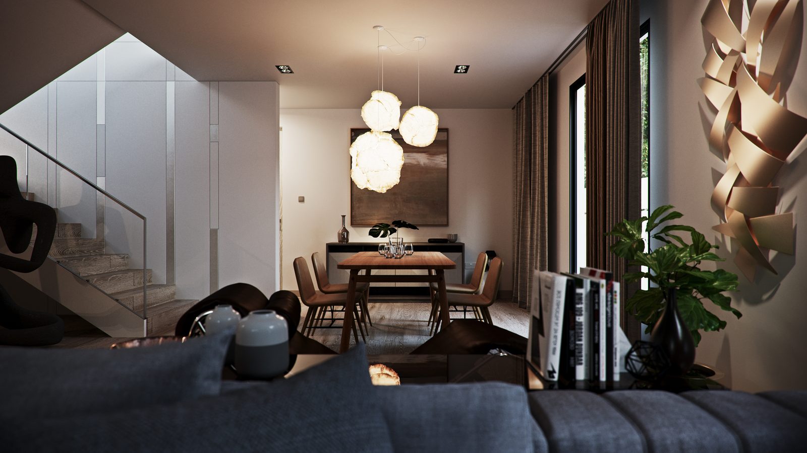 The dining corner from the sofa: stair to the left, three pendants over the table and full-height glazing to the garden.