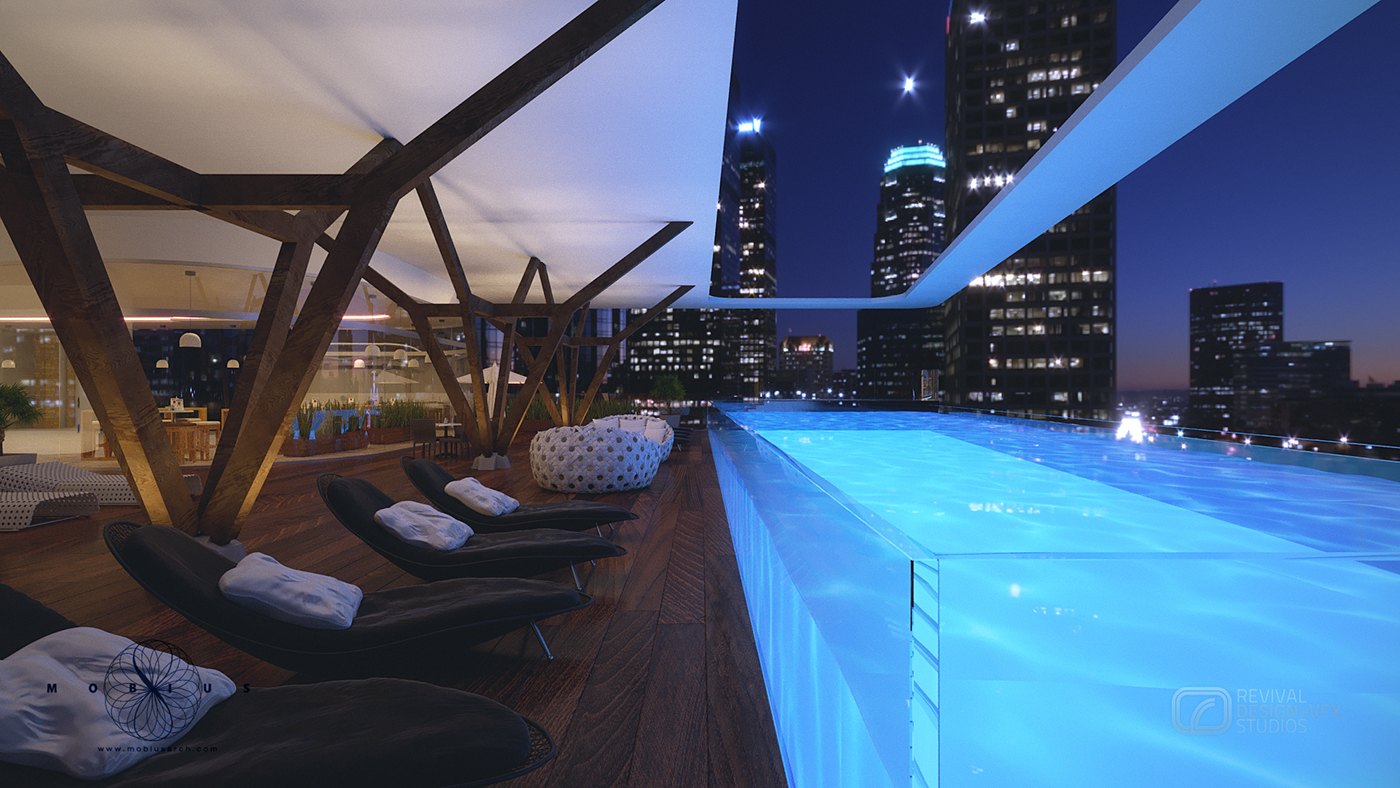 Night view along the rooftop infinity pool: the water glows bright cyan against a dark skyline of lit towers, black lounge chairs with folded white towels line the timber deck, and the angled pergola posts cut across the sky.