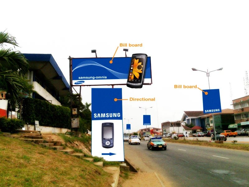 Composite photograph of a real Accra road: blue Samsung billboards and a tall directional sign with a phone image are keyed with orange labels Bill board and Directional, cars driving past low buildings.