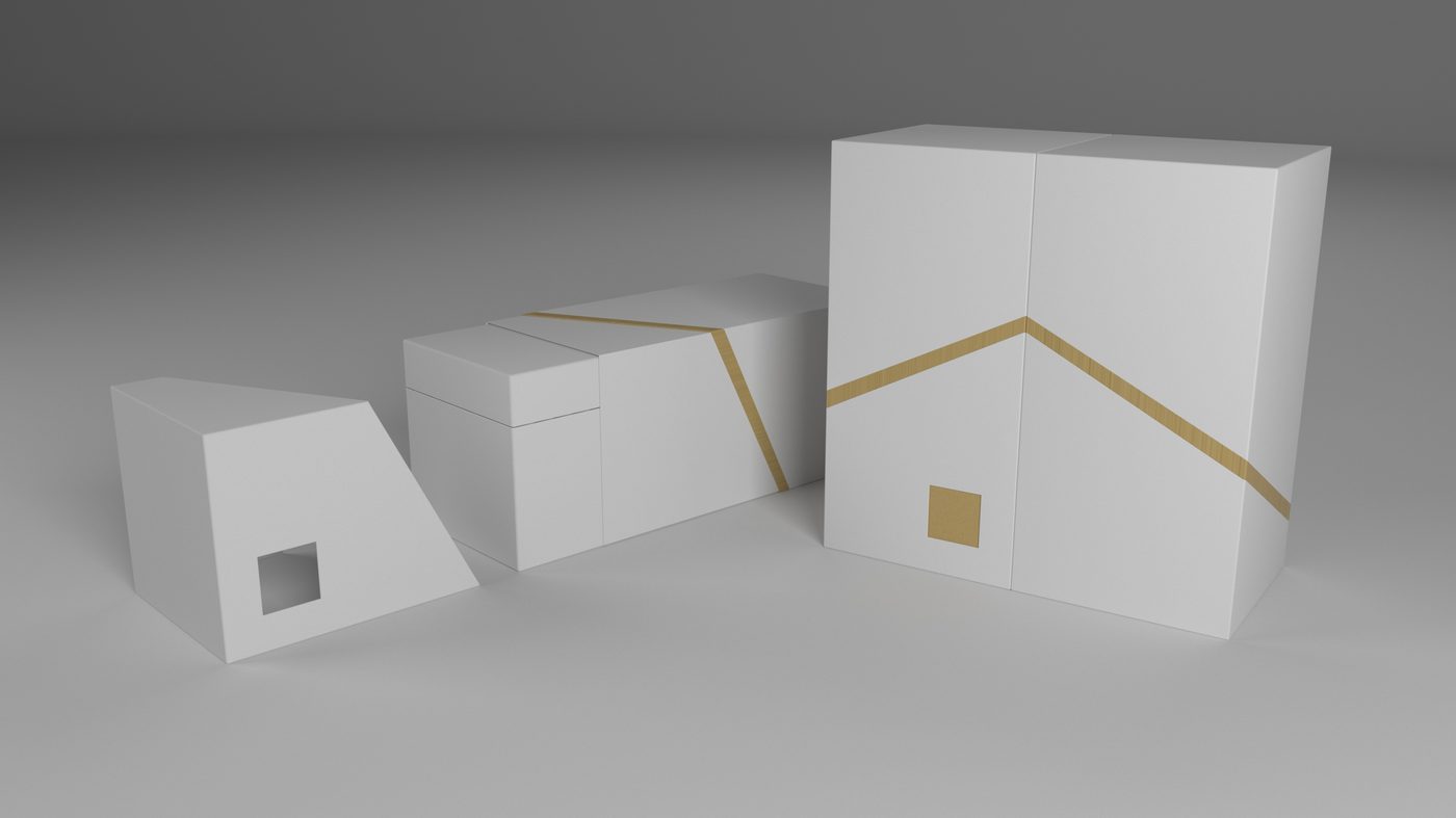 Secondary packaging: two angular cartons that meet to form a pitched roofline, printed with a gold band and a small gold square.