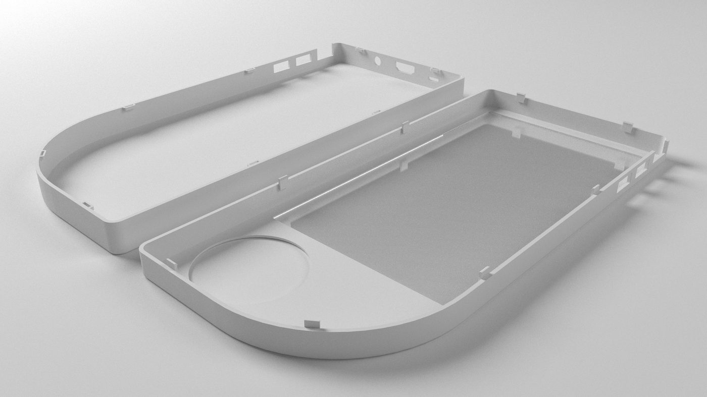 Unfinished clay model of the two housing shells laid open, showing the screen aperture, the dial well and the snap-fit ribs along the rim.