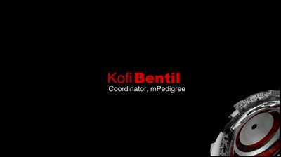 Video still: the name Kofi Bentil set half in red and half in white on black, with Coordinator, mPedigree beneath in small white type and the silver gear with a red centre disc at the lower right.