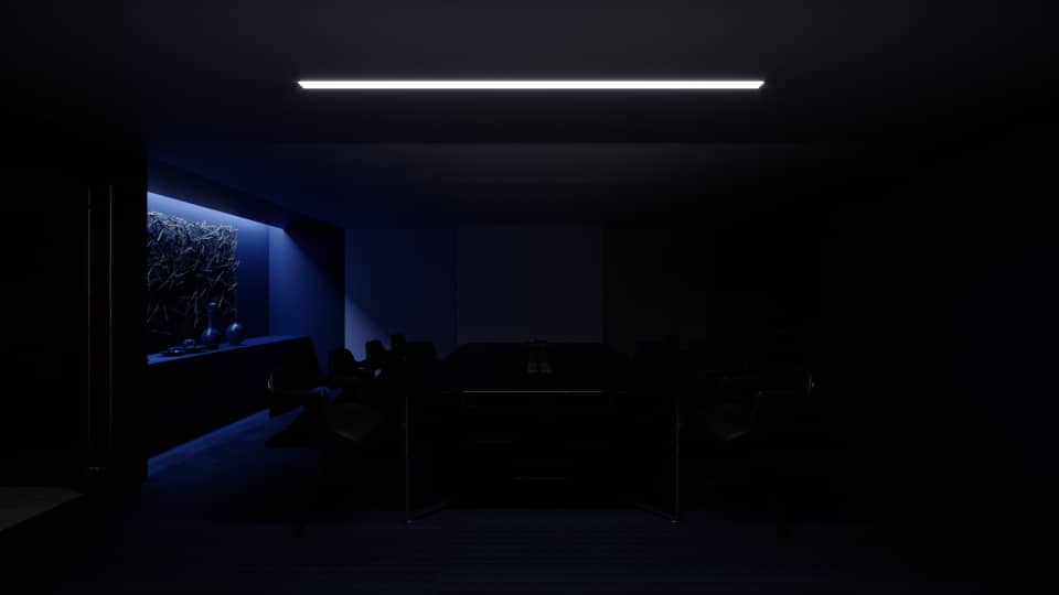 The Fitzgerald boardroom from the far end with all but one light out: a single linear ceiling fitting reads across the black ceiling while the table, chairs and the blue-lit niche at left sit barely visible in the dark.