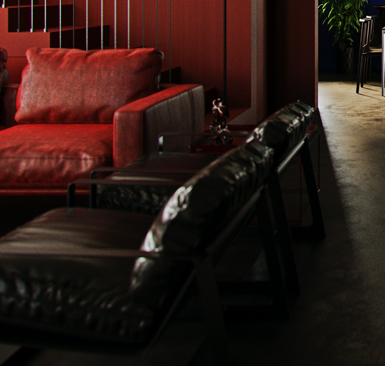 TTD seating corner: red sofa, black leather sling chair and a glass side table carrying a metal sculpture, red stair and steel balusters behind.