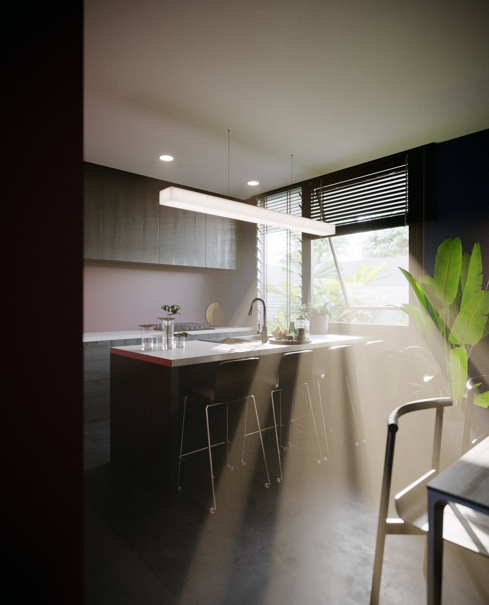 TTD kitchen by day: white island with a red edge band and three black stools, grey upper cabinets against a mauve wall, sun through black blinds.