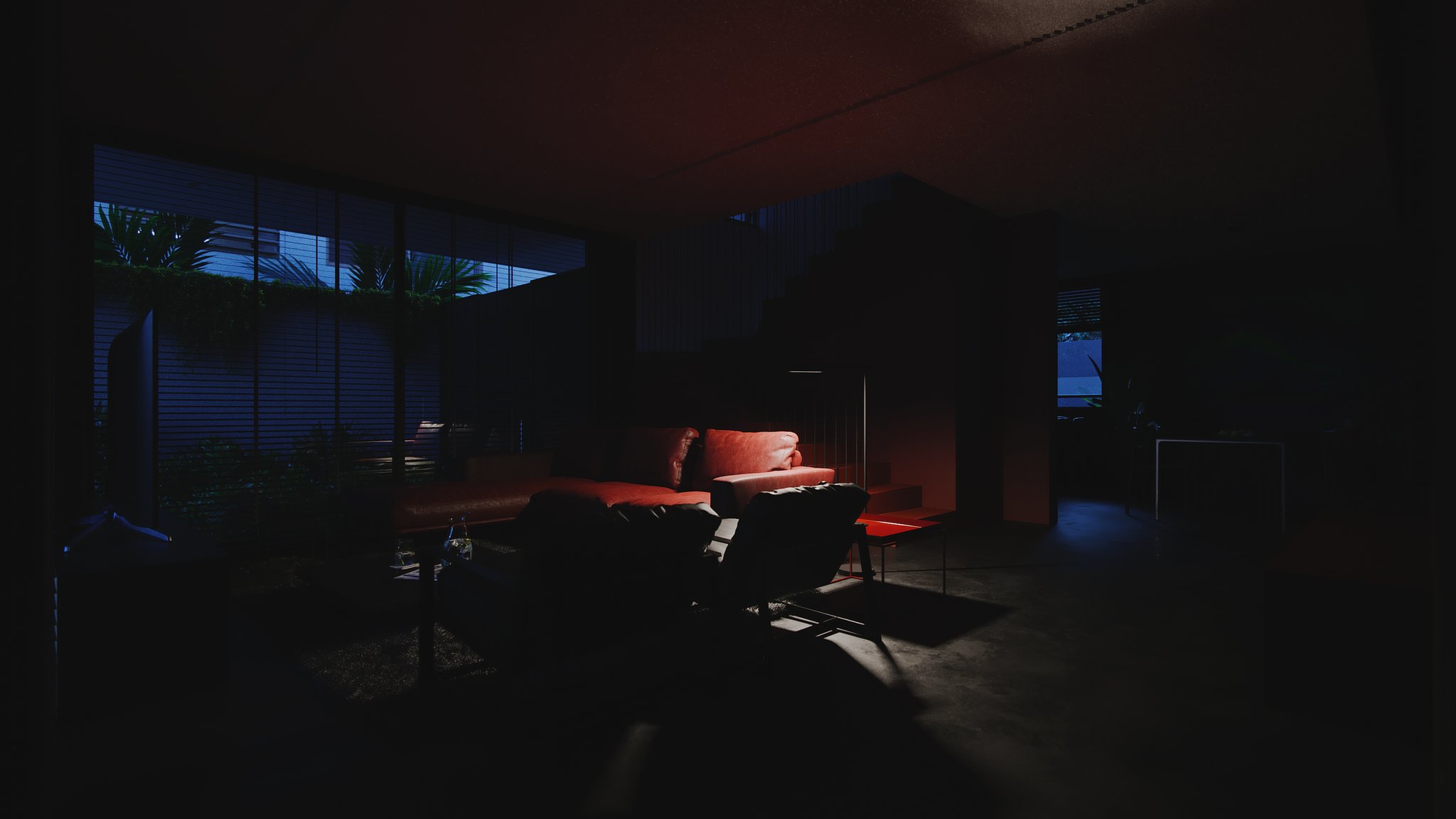 TTD the same lounge near-dark at night: ceiling strips off, faint red glow on the sectional cushions, one shaft of light on the concrete floor.