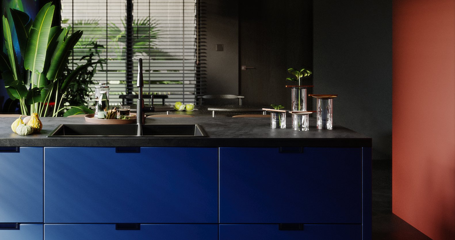 TTD kitchen island with deep blue cabinet fronts under a dark grey stone top, black sink and tall tap, glass vases with monstera cuttings.