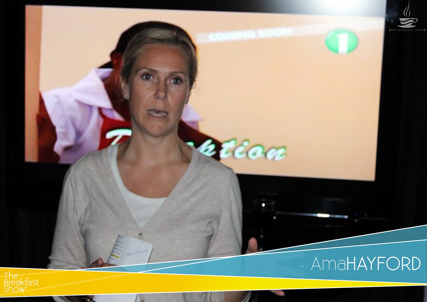 Photograph of a presenter on a studio set, a monitor glowing behind her, with the proposed lower third overlaid in teal and yellow: the cup logo at the left and the name strap reading AmaHAYFORD at the right.