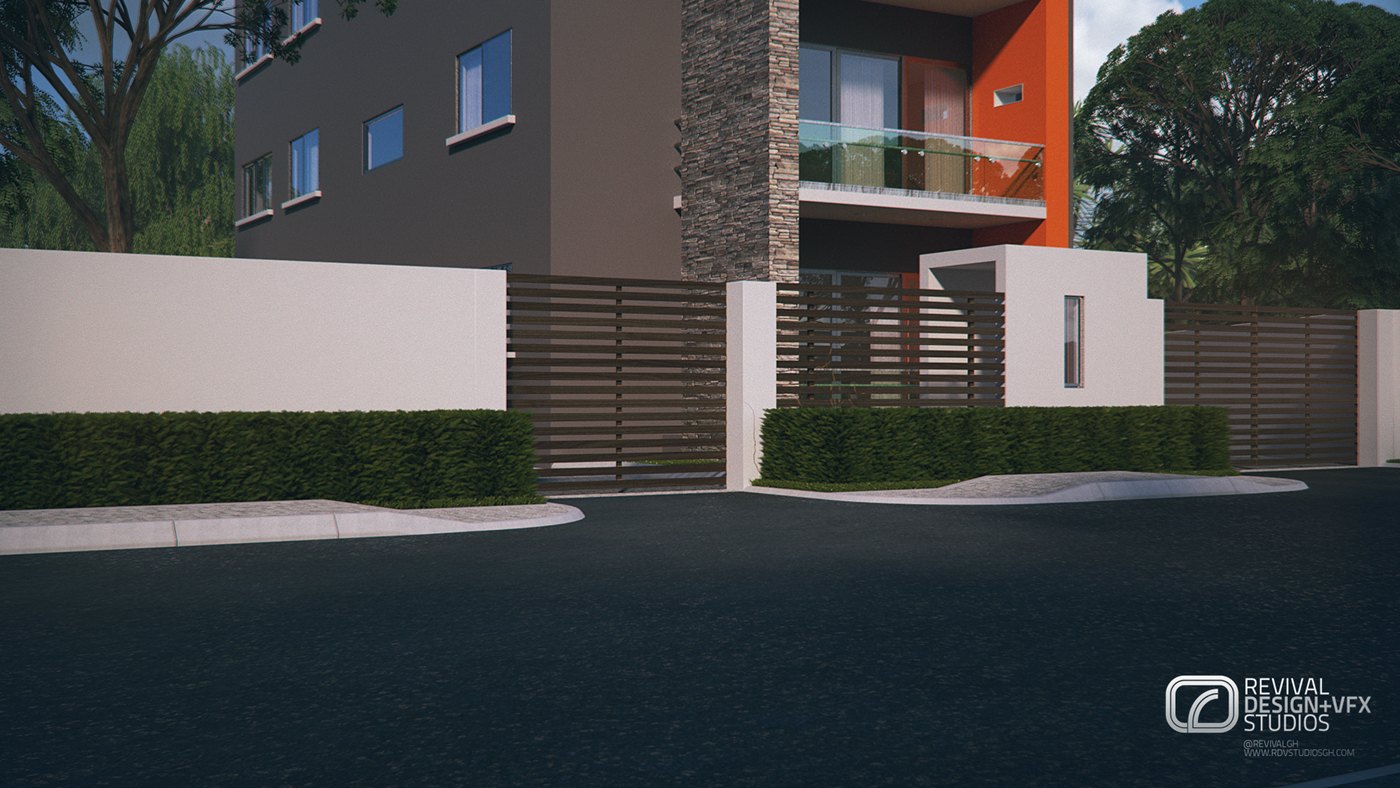 Street-level exterior render: a dark grey apartment block with stone-clad panels and an orange balcony volume, behind white boundary walls, timber slat gates and clipped hedges, with empty asphalt road across the foreground.